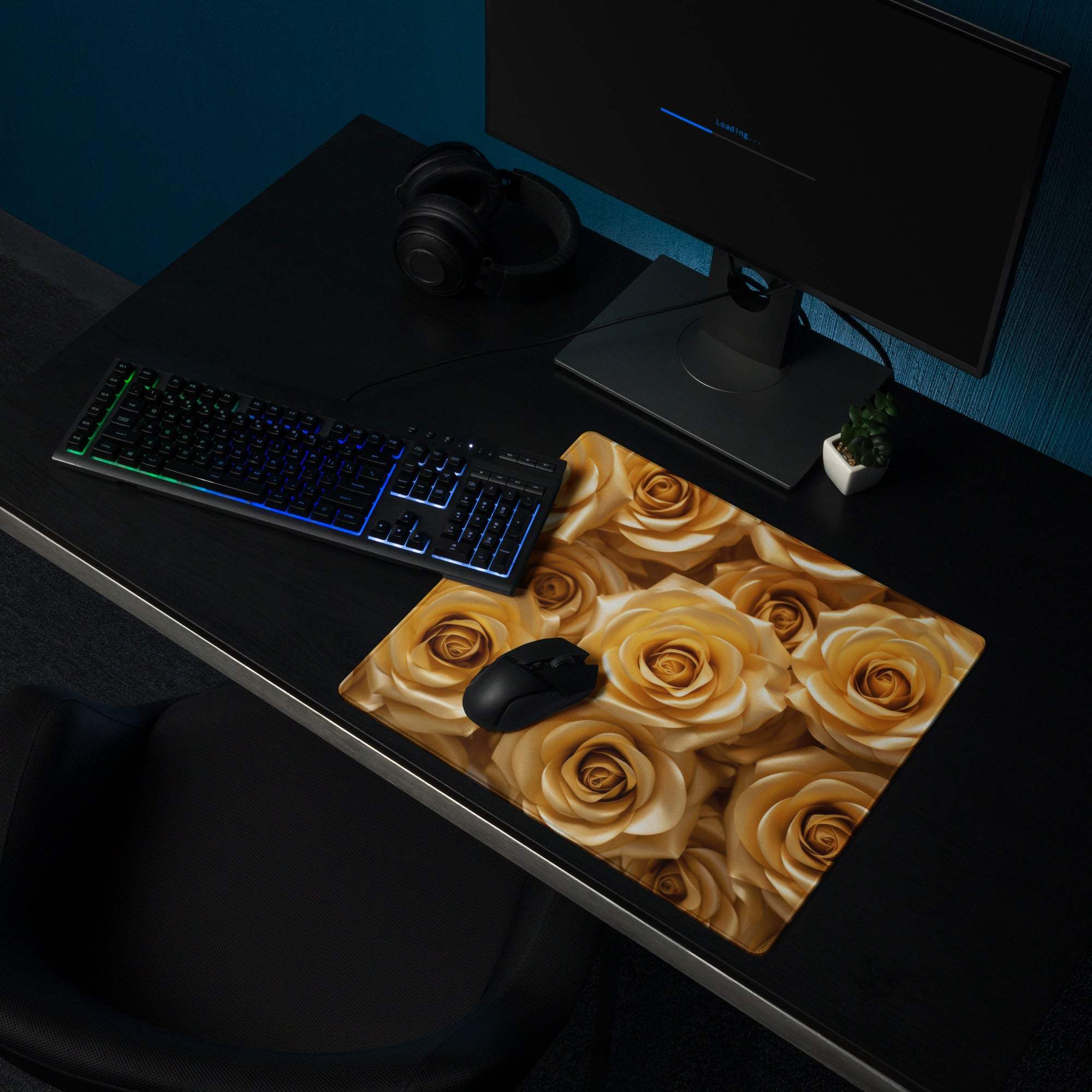 Luxurious golden rose gaming mouse pad with non-slip base on dark desk