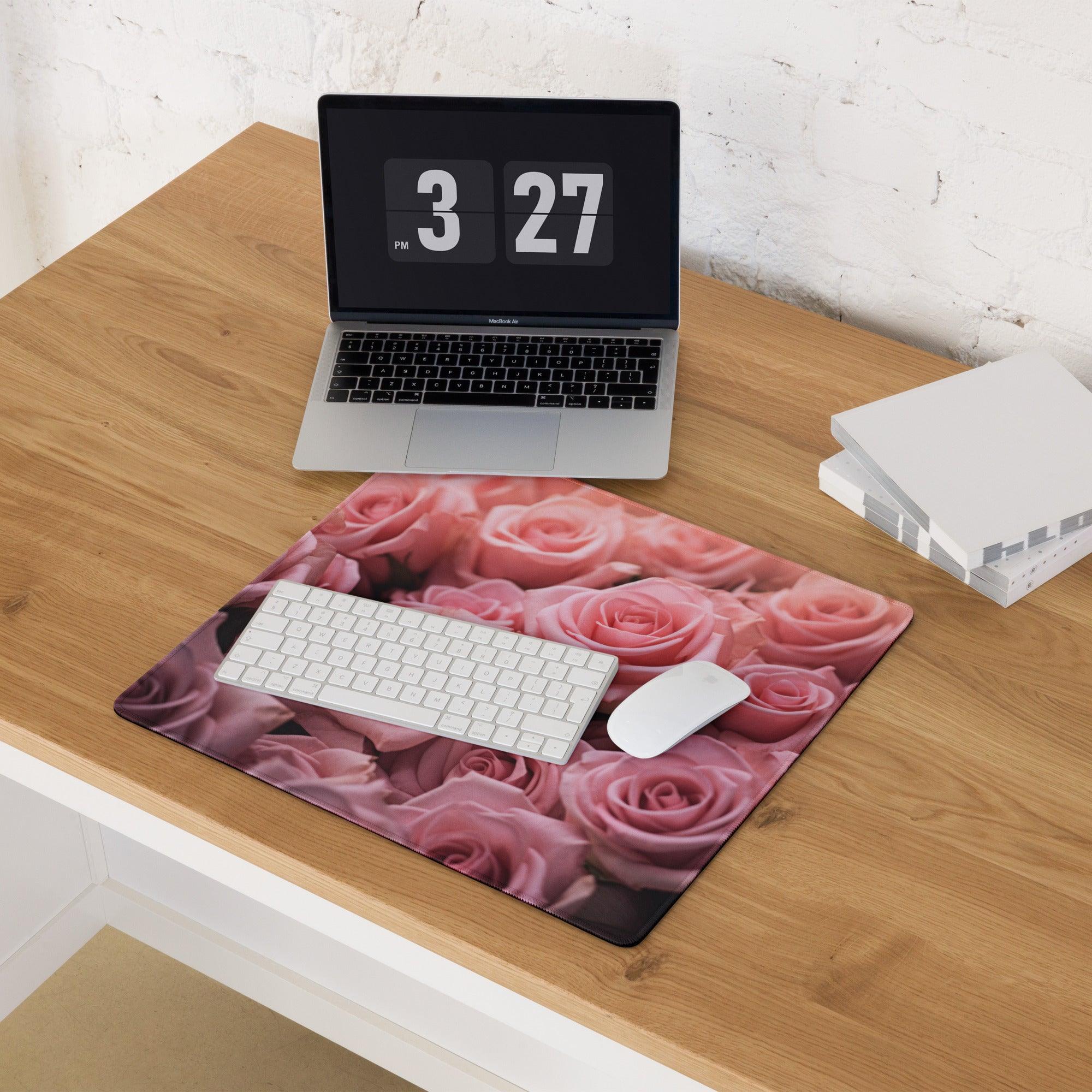 Pink rose-patterned gaming mouse pad with non-slip base and stitched edges