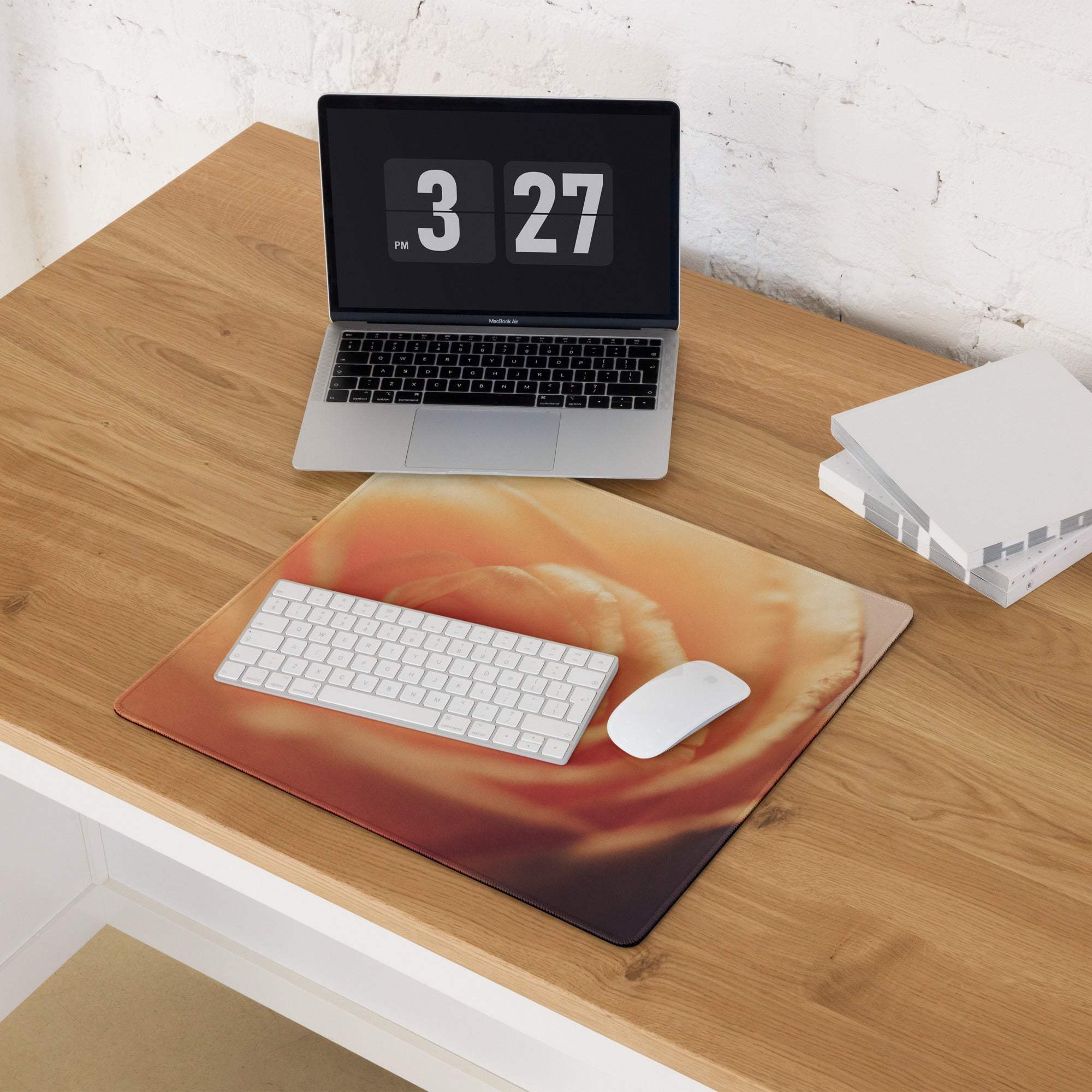 Orange rose-patterned gaming mouse pad with edge stitching and non-slip backing