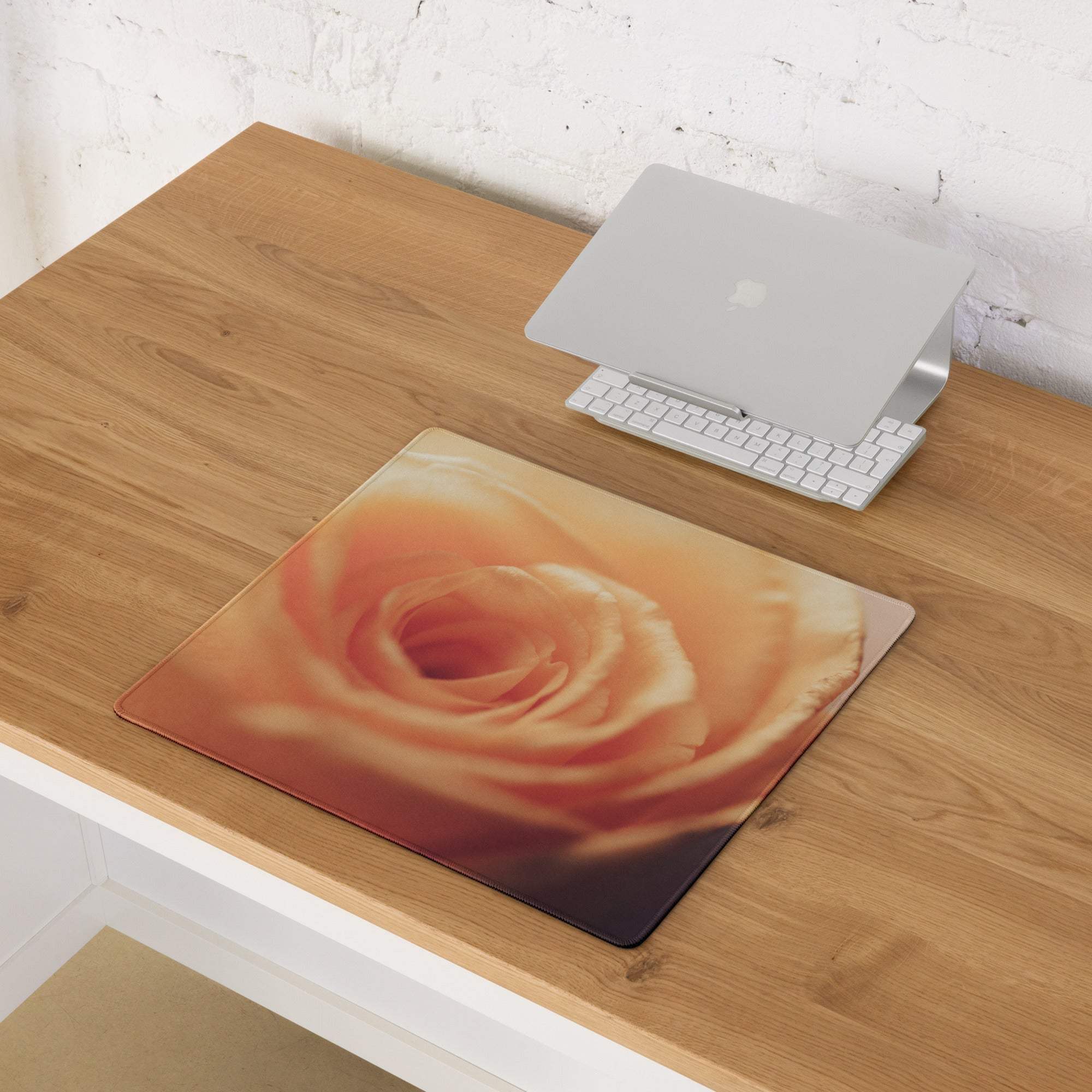 Large romantic peach rose gaming mouse pad with edge stitching, non-slip backing