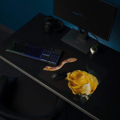 Black gaming mouse pad with yellow rose and snake design