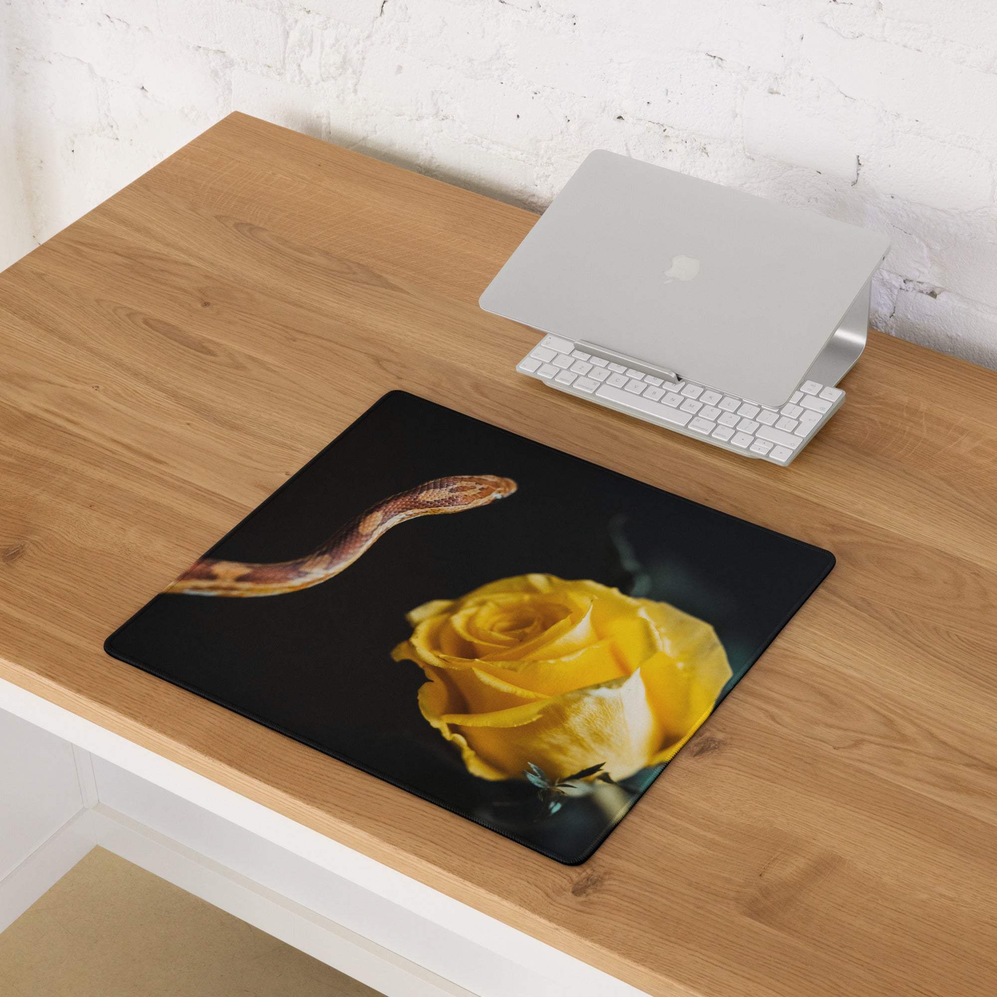 Elegant black gaming mouse pad with yellow rose and snake design