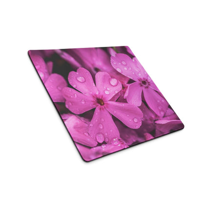 Vibrant pink floral gaming mouse pad with blossoms, dew drops, non-slip base, stitched edges