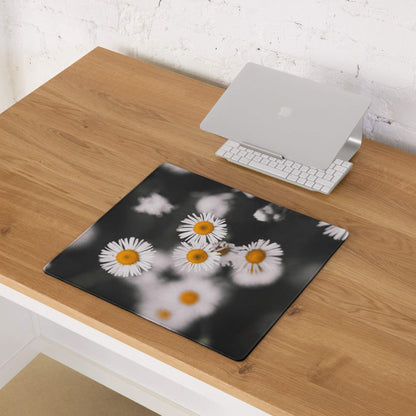Large black gaming mouse pad with soft-focus white daisy print