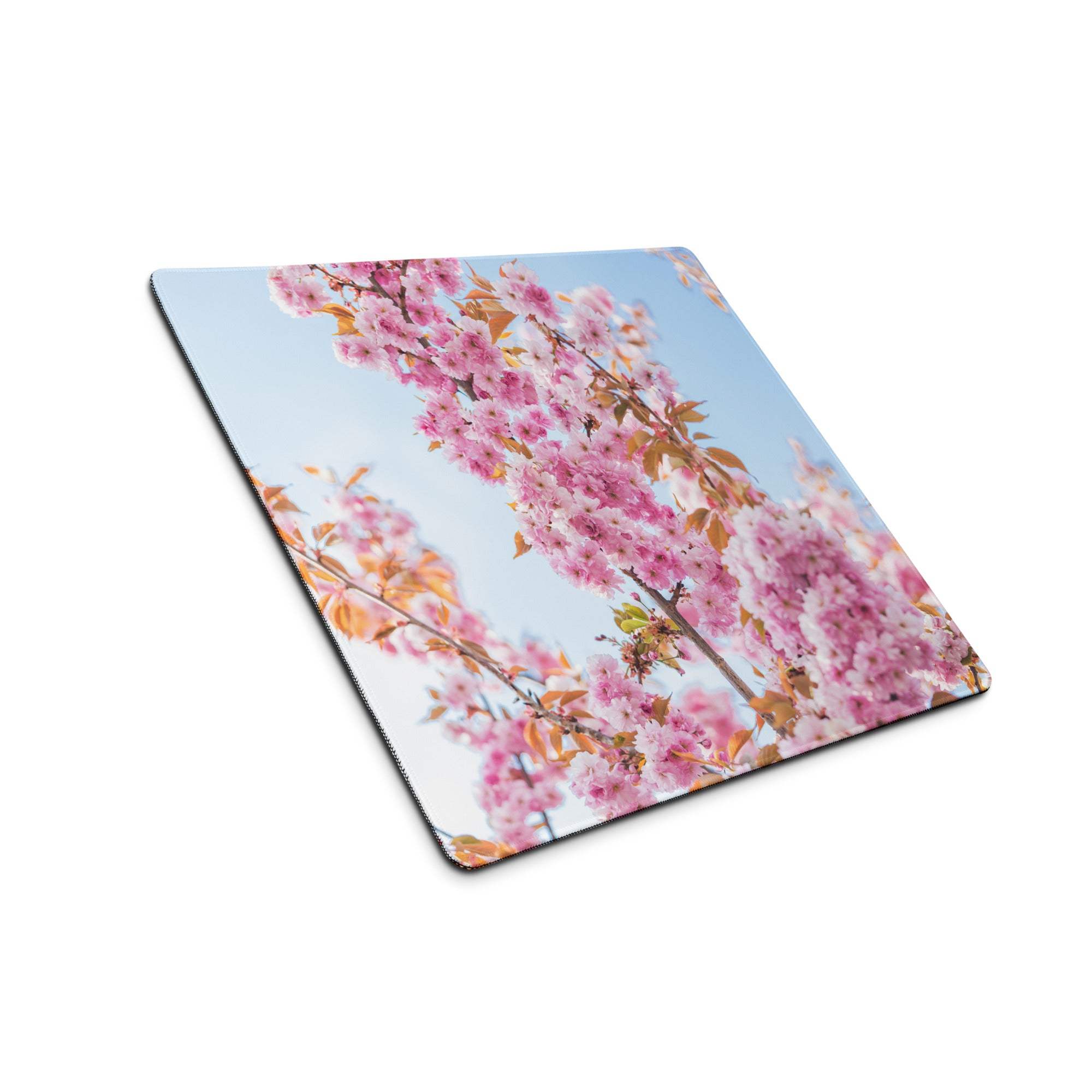 Square pink cherry blossom gaming mousepad with matte finish and stitched edges