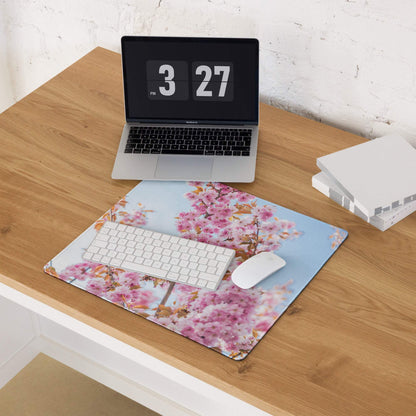 Pink cherry blossom gaming mousepad with light blue sky background
