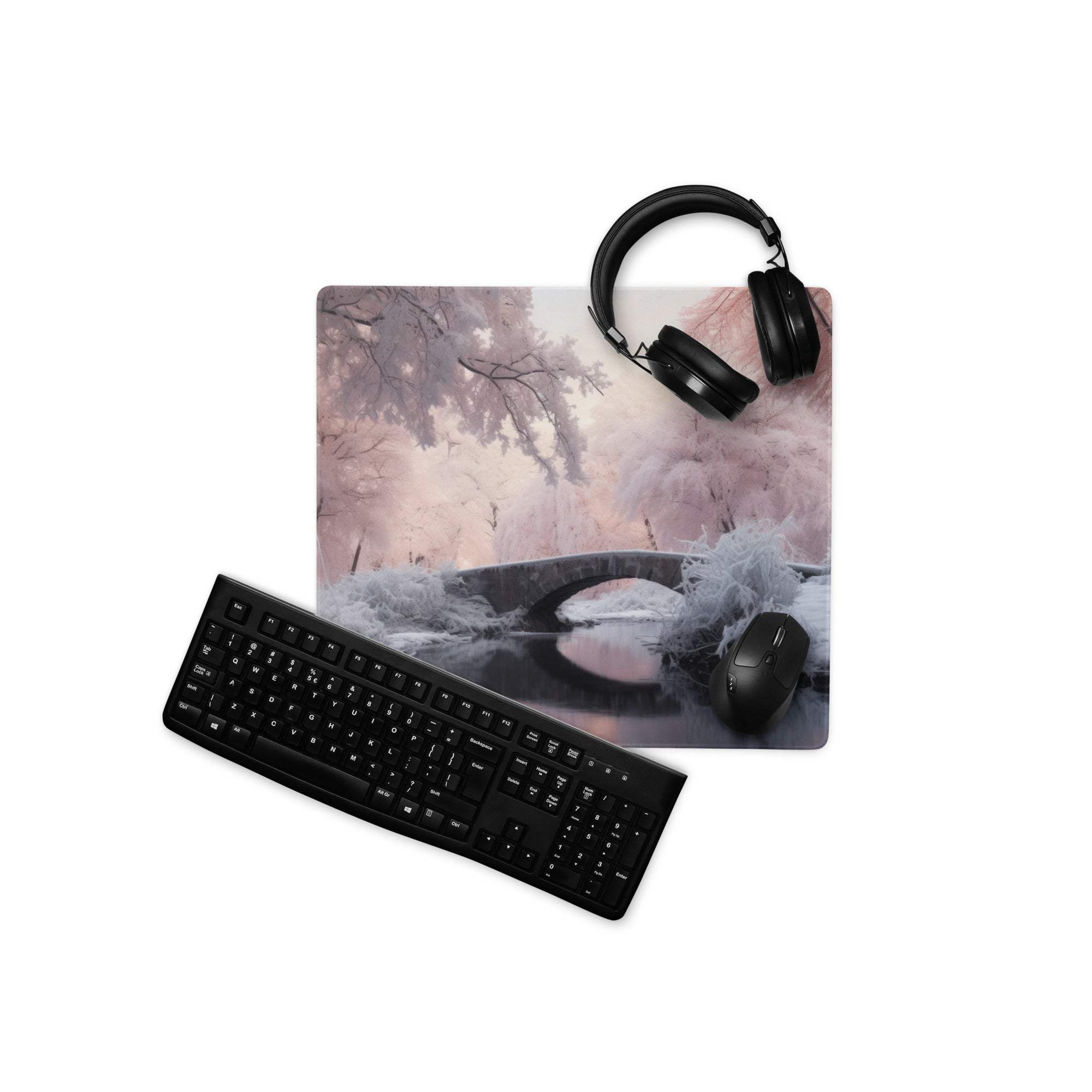 Black keyboard and mouse on dreamy winter pink landscape gaming mousepad