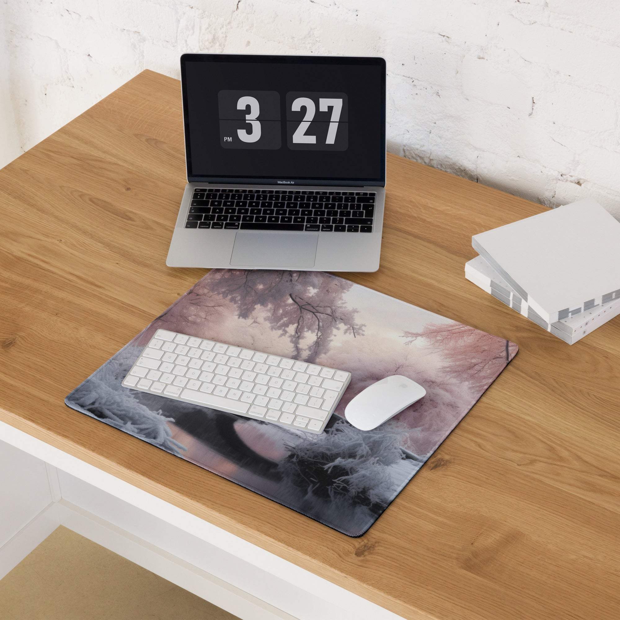 Dreamy winter pink landscape gaming mouse pad with misty forest design