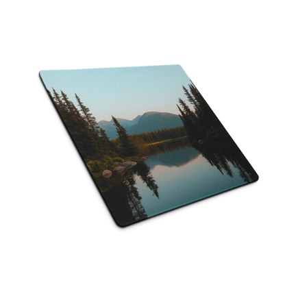 Calm blue forest lake gaming mouse pad with serene mountains and twilight hues