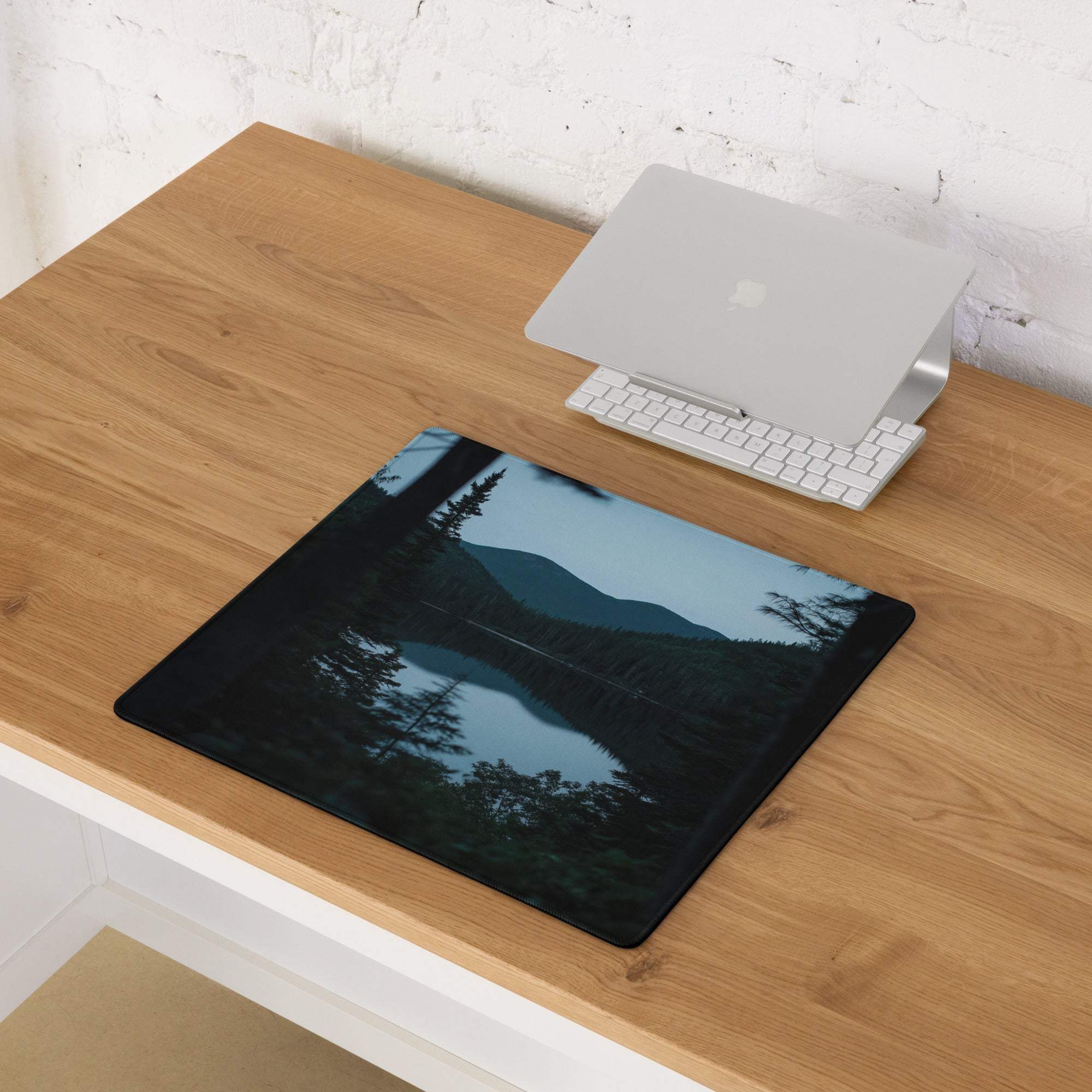 Black rectangular mousepad with serene mountain lake reflection in Forest Serenity style