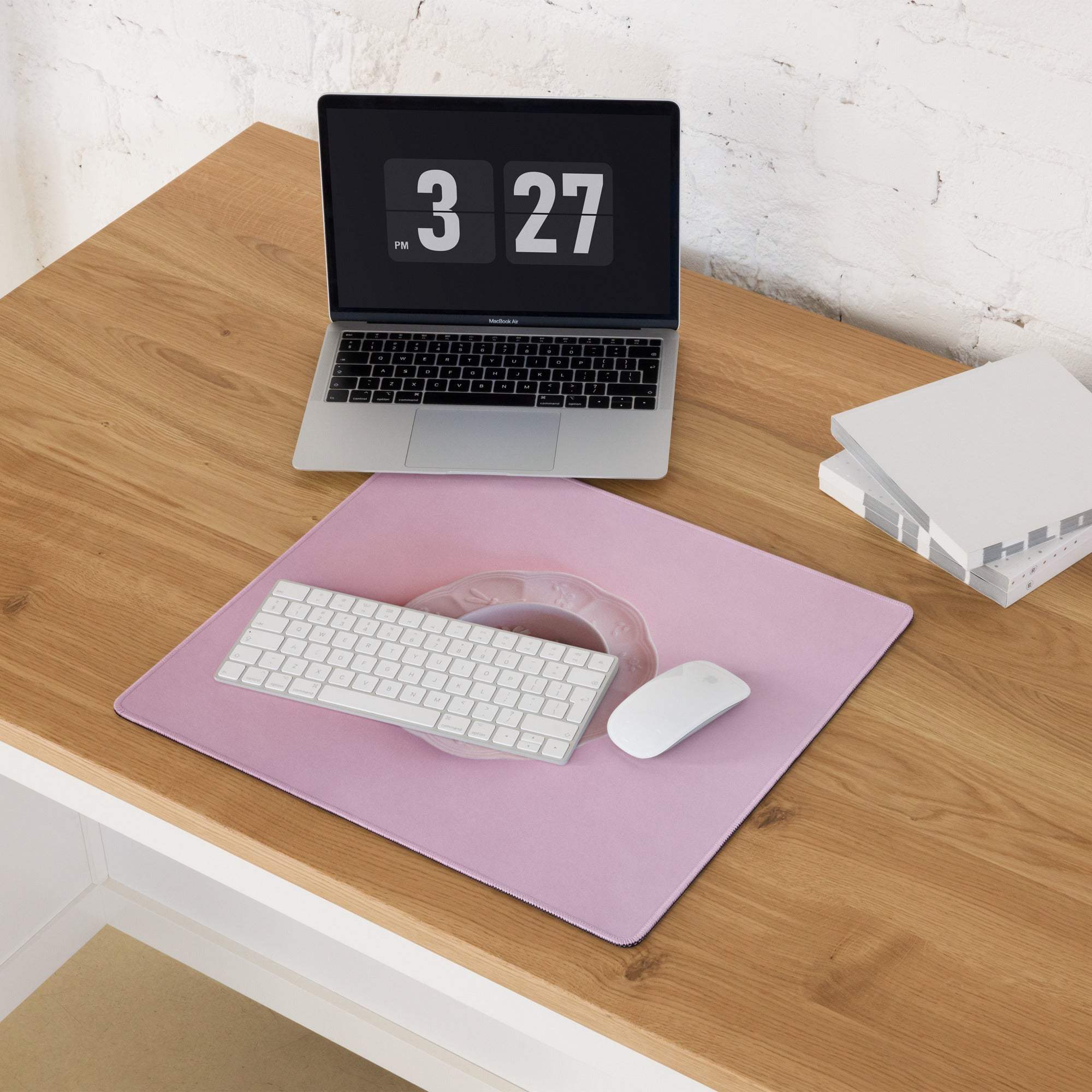 Pink rectangular gaming mousepad with keyboard cutout and non-slip backing
