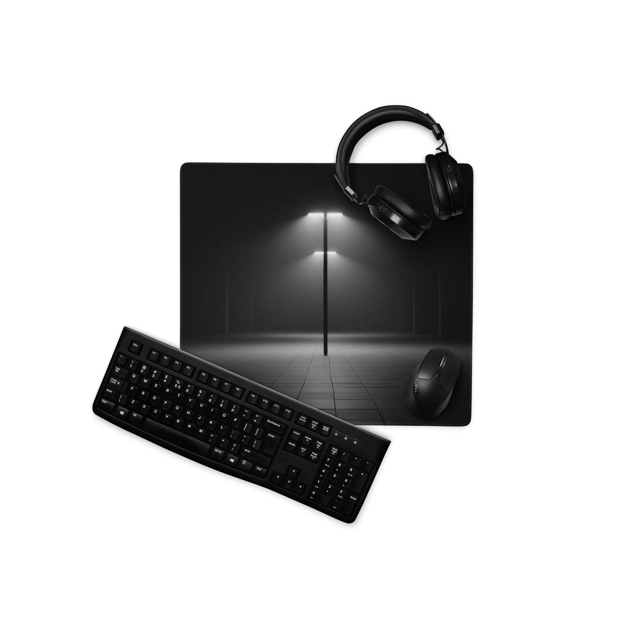 Black large gaming mouse pad with streetlamp scene, headphones on top