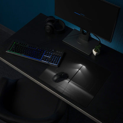 Black gaming mousepad with minimalist geometric lines, non-slip base, stitched edges