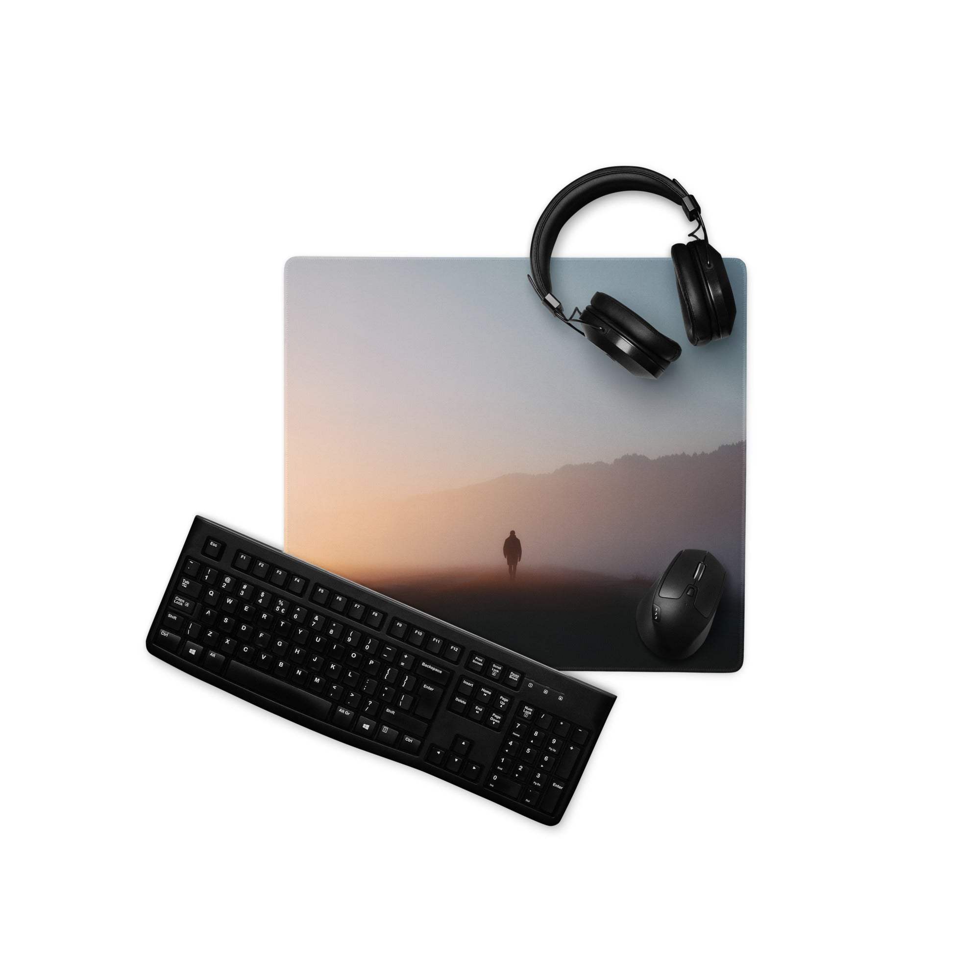 Large immersive sunset gradient gaming mouse pad with silhouetted mountains
