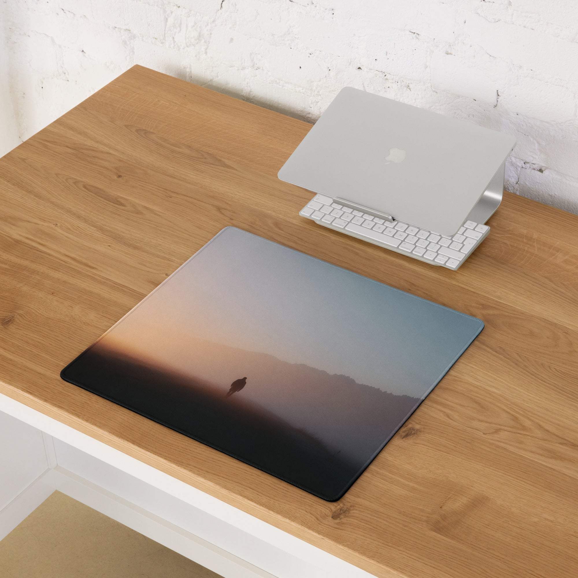 Immersive sunset gradient gaming mouse pad with bird silhouette