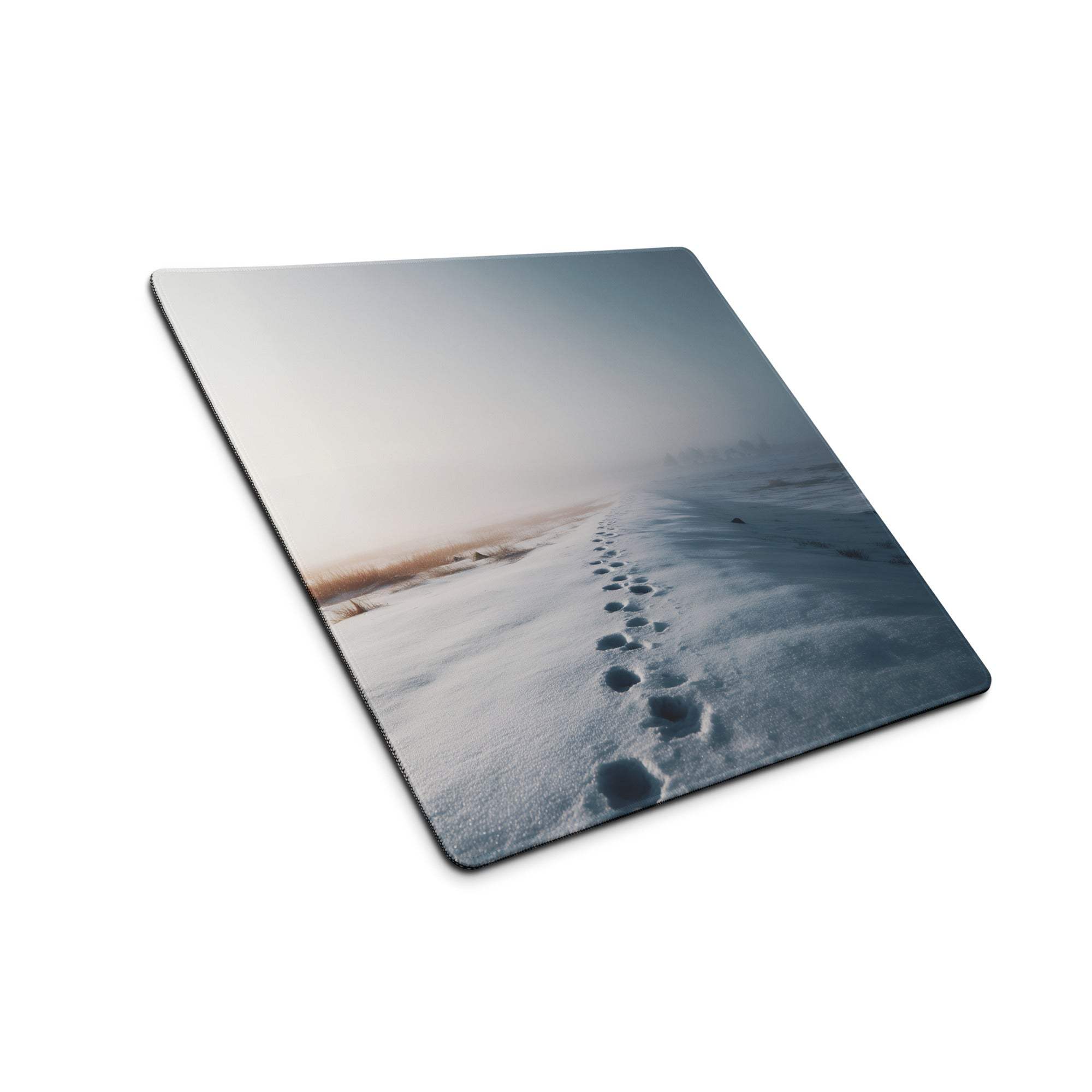 Large calm winter blue snowfield gaming mouse pad with footprints in misty snow