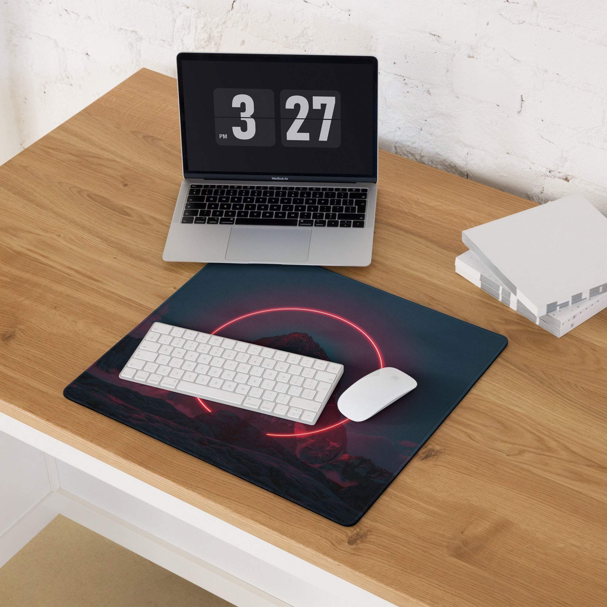 Black gaming mousepad with glowing red neon circle on cyberpunk mountain scene