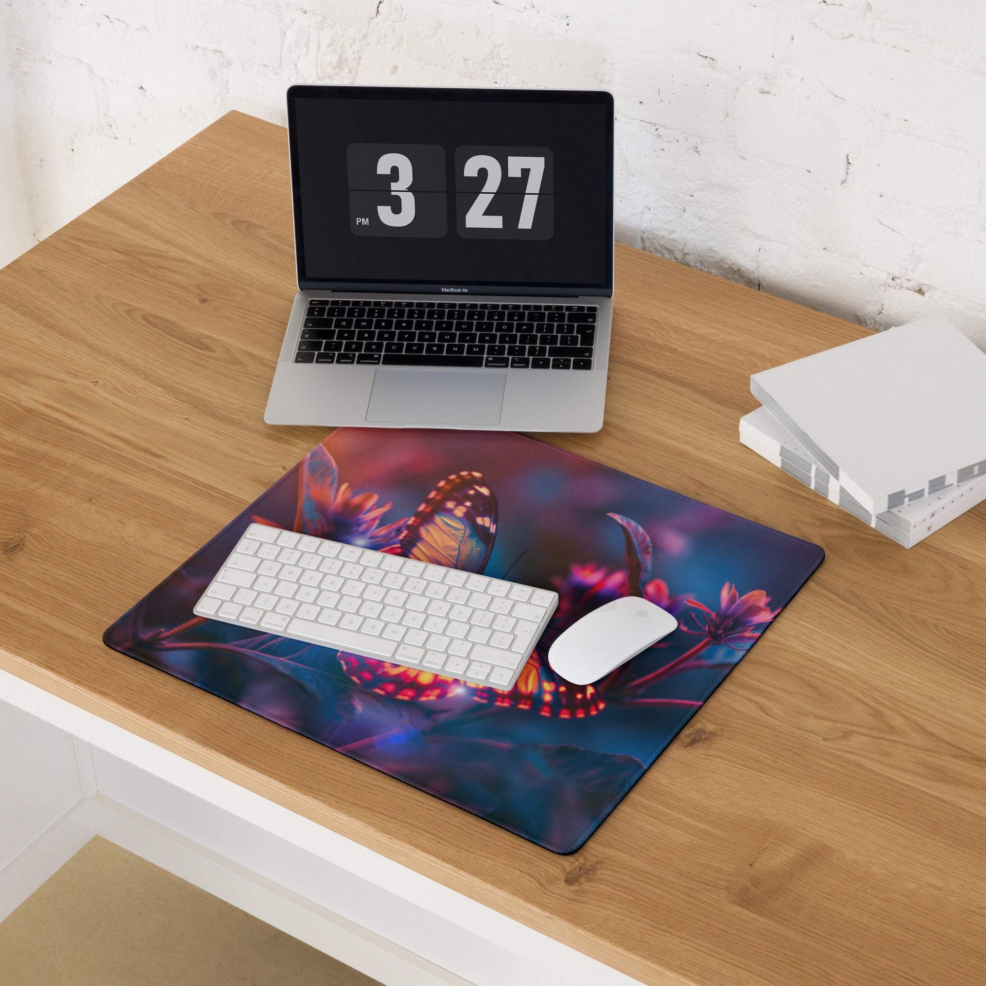Vibrant butterfly garden gaming mouse pad with colorful glow, large surface, non-slip backing