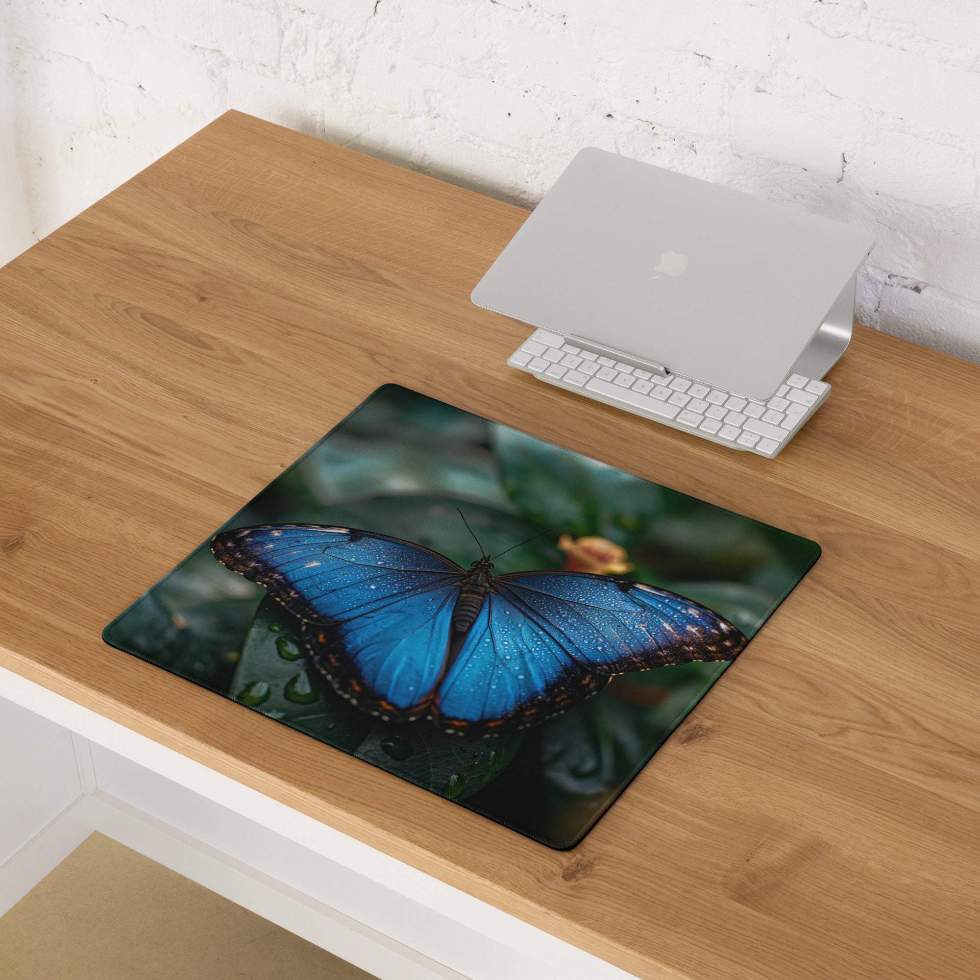 Vibrant blue butterfly large gaming mouse pad with wings, dew drops on leaf