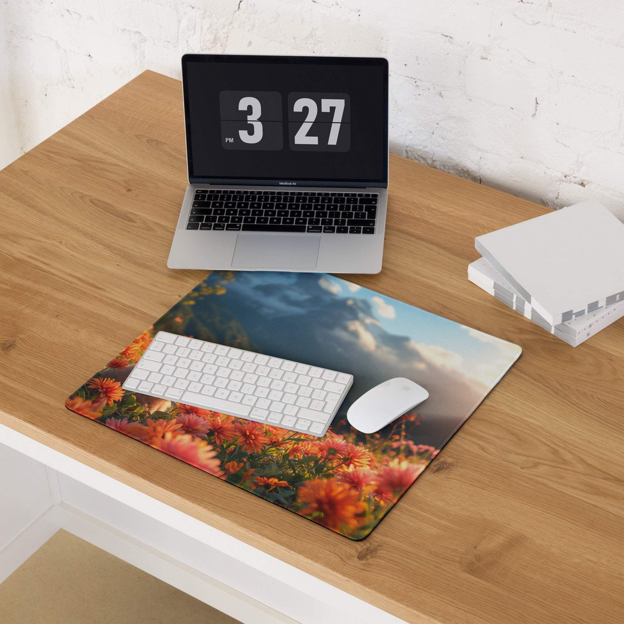Vivid Floral Field gaming mouse pad with puppy, orange pink blossoms on desk