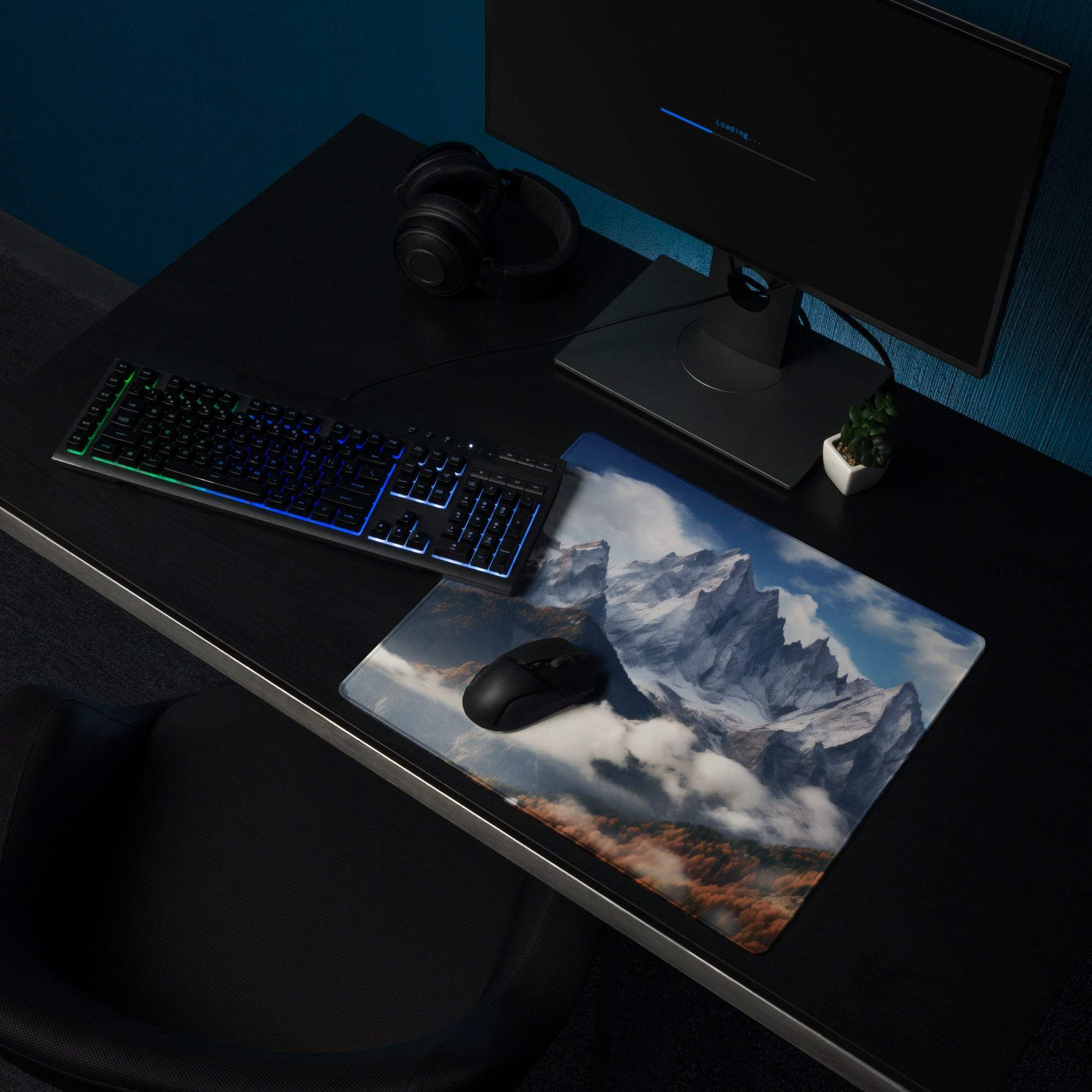 Epic Mountain Landscape mouse pad with snow-capped peaks on dark desk