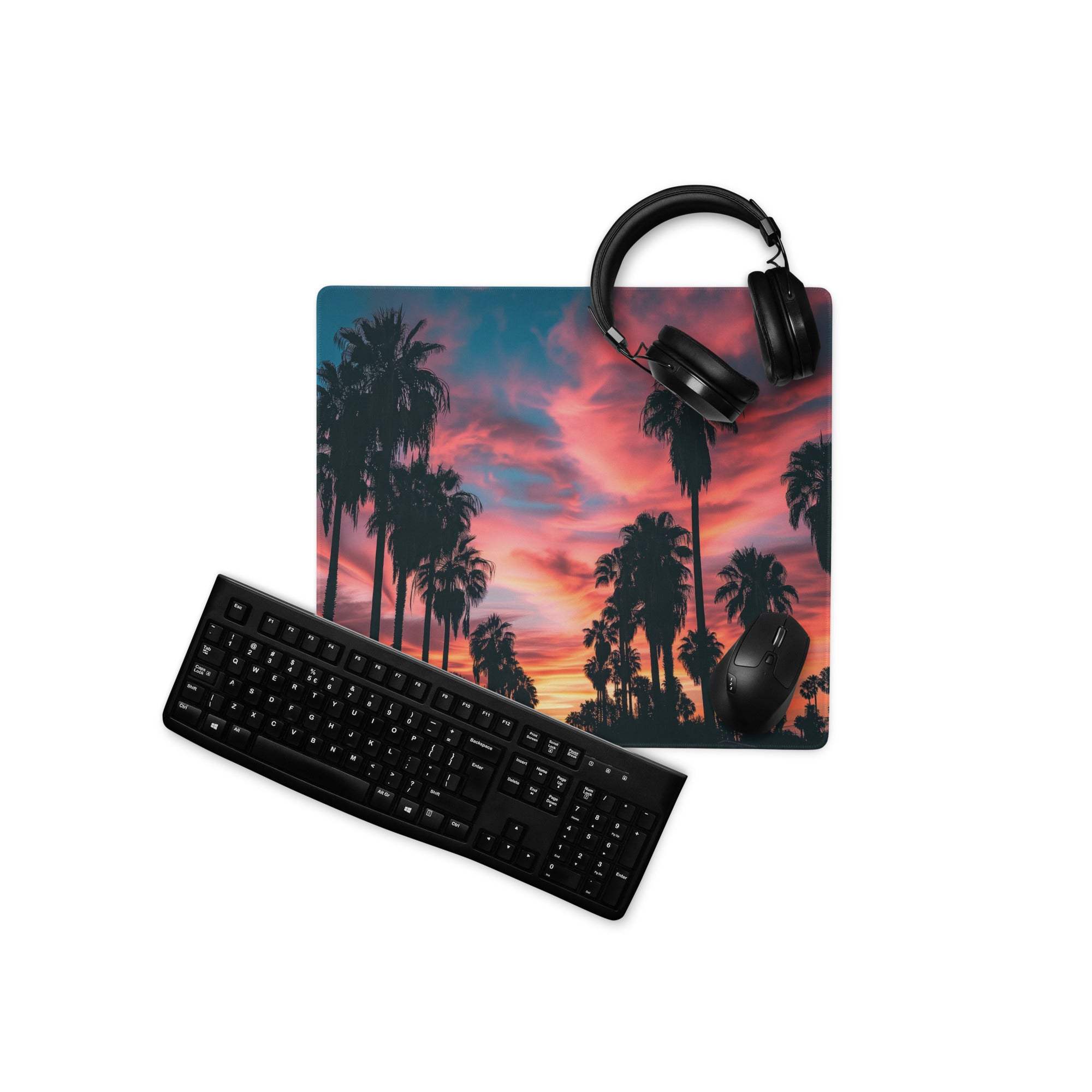 Black keyboard on large palm tree sunset gaming mouse pad