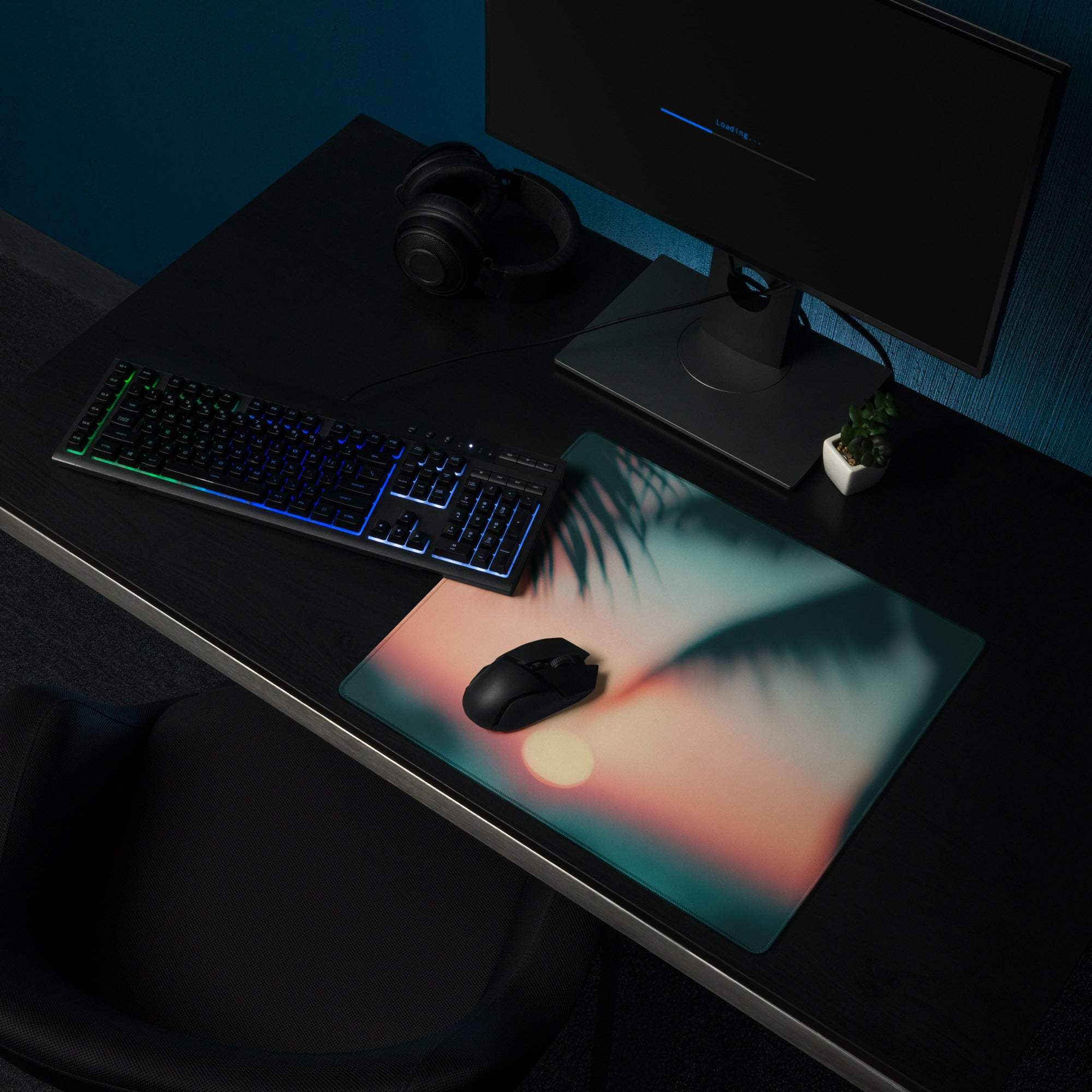 Premium large sunset glow gaming mouse pad with vibrant sunset and palm fronds on desk