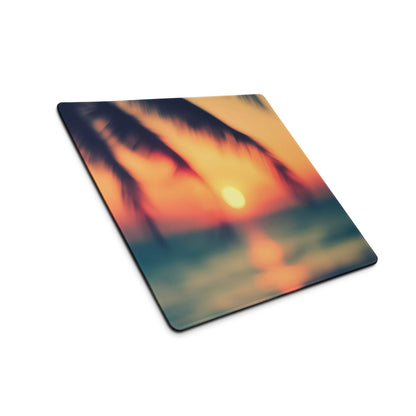 Vibrant sunset gaming mouse pad with palm silhouettes, non-slip base, edge stitching