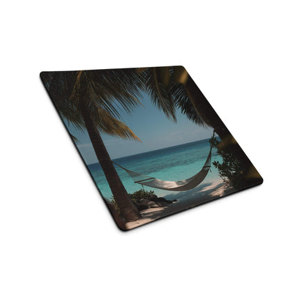Beige hammock between palm trees over turquoise ocean on blue gaming mouse pad
