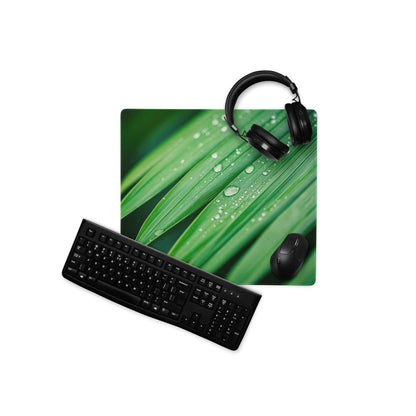 Green leaf-patterned gaming mousepad with water droplets, non-slip base