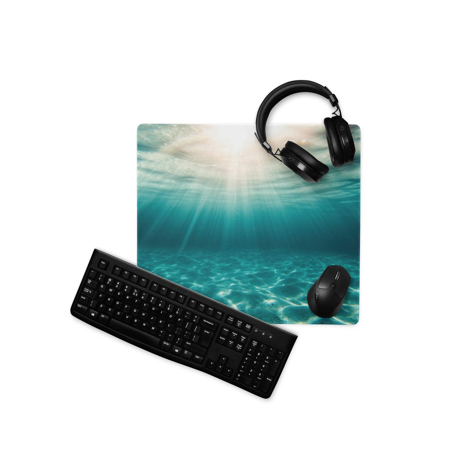 Large underwater ocean scene gaming mouse pad with black keyboard and headset
