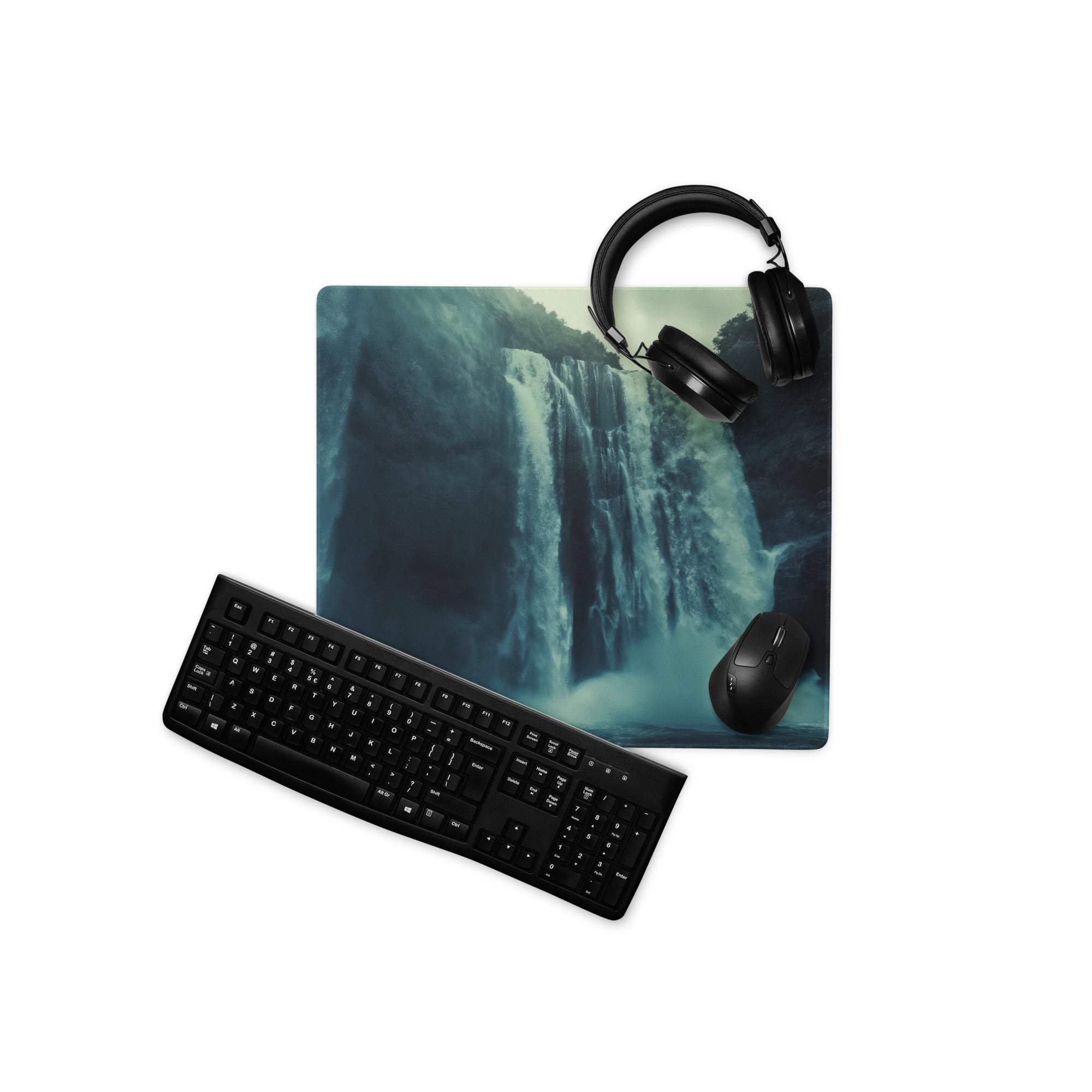 Black keyboard on Epic Waterfall Scene Moody Blue gaming mouse pad