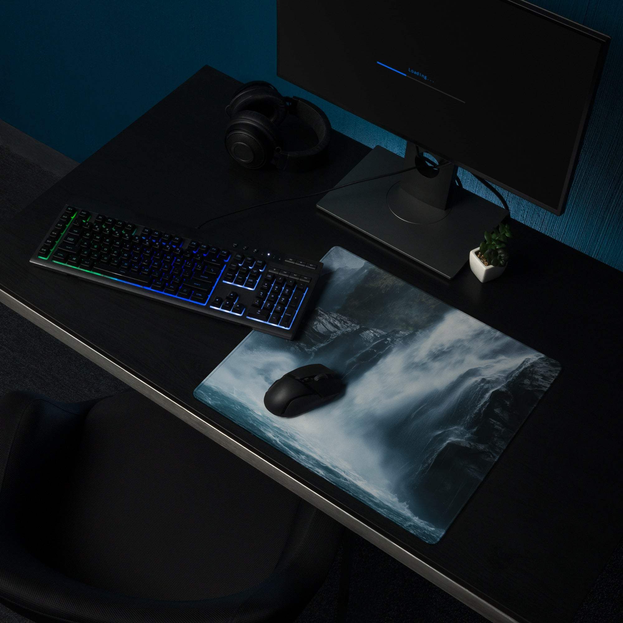 Blue and white Moody Blue Waterfall gaming mousepad with black wireless mouse