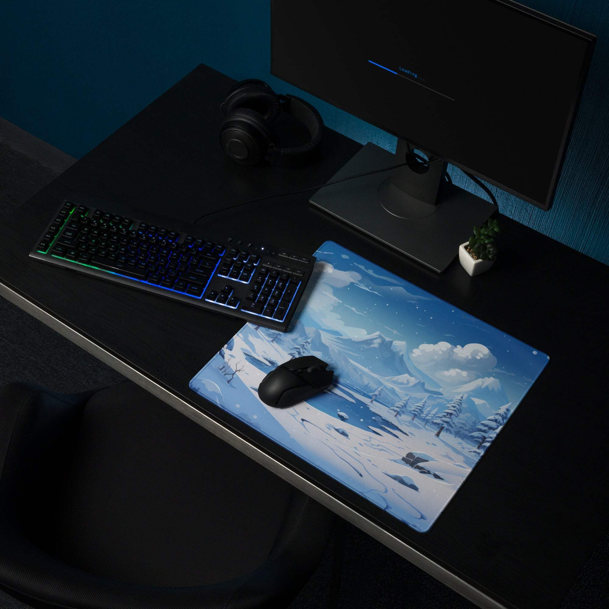 Blue snowy mountain landscape gaming mousepad with black wireless mouse