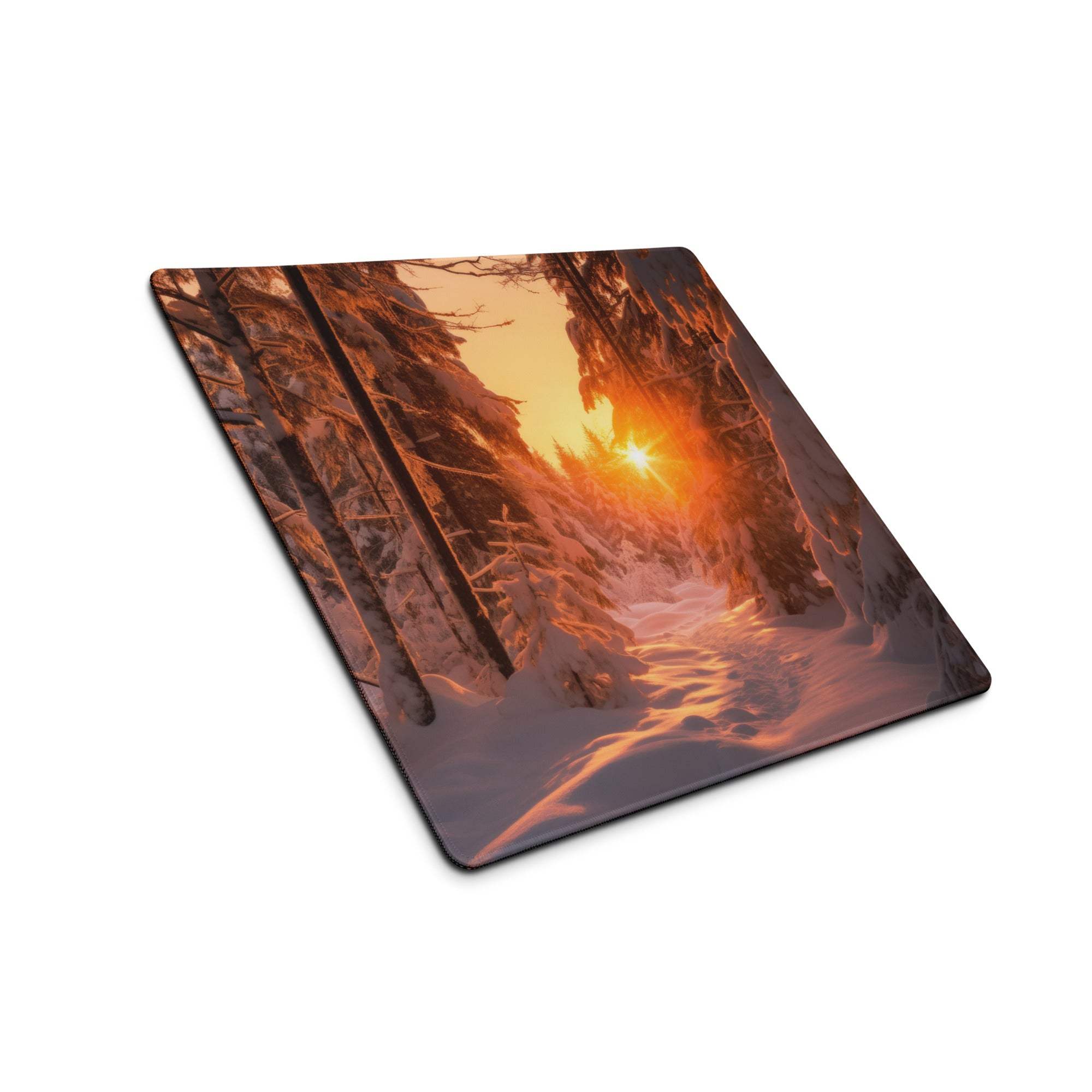 Vivid snowy forest sunrise gaming mouse pad with orange glow