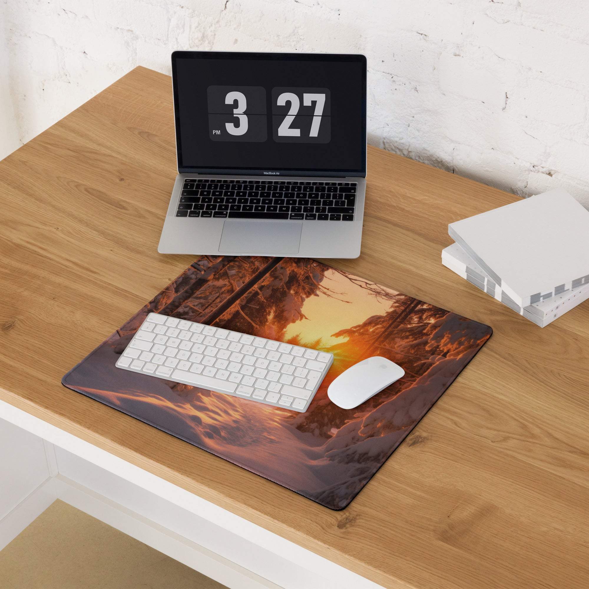 Vivid sunset mousepad with orange glow, tree silhouettes, non-slip backing