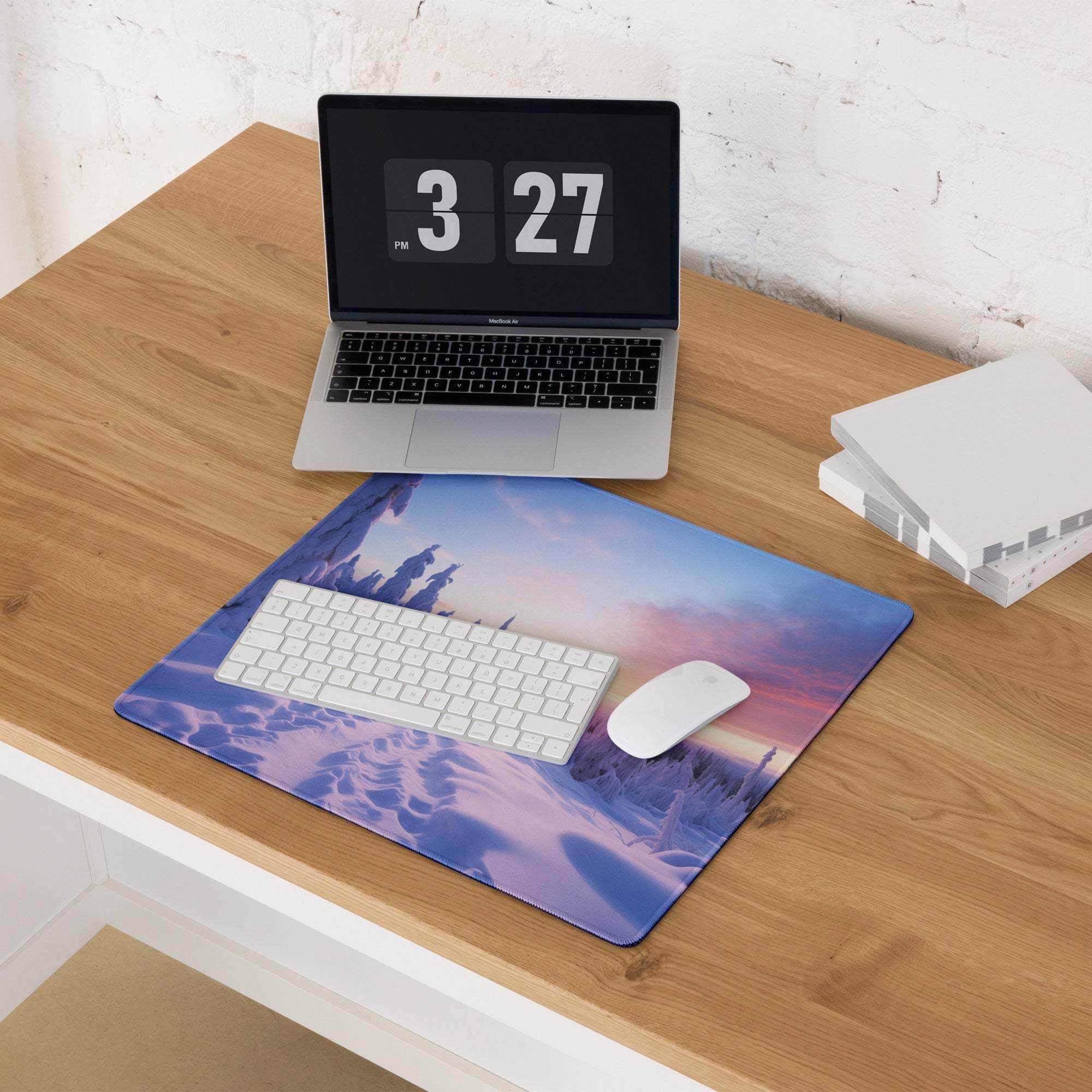 Large gaming mouse pad with icy purple sunset mountains and edge stitching