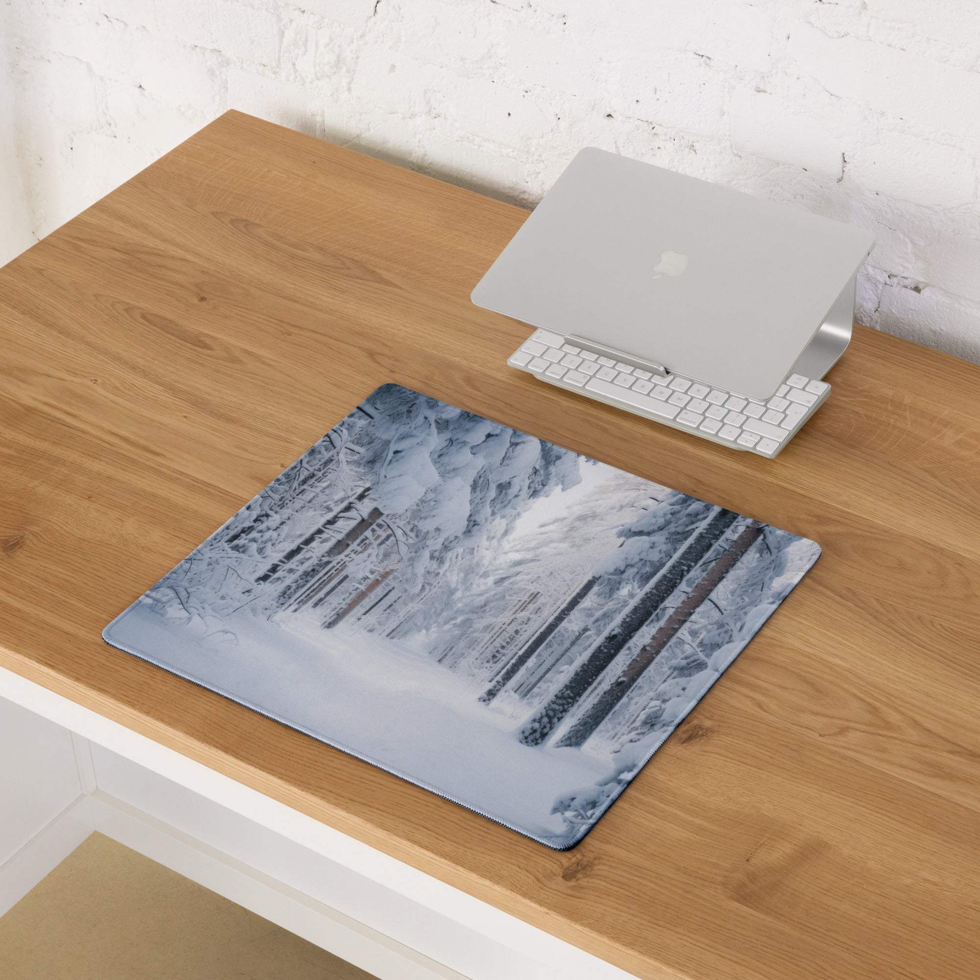 Winter Forest gaming mouse pad with large surface, non-slip base, edge stitching