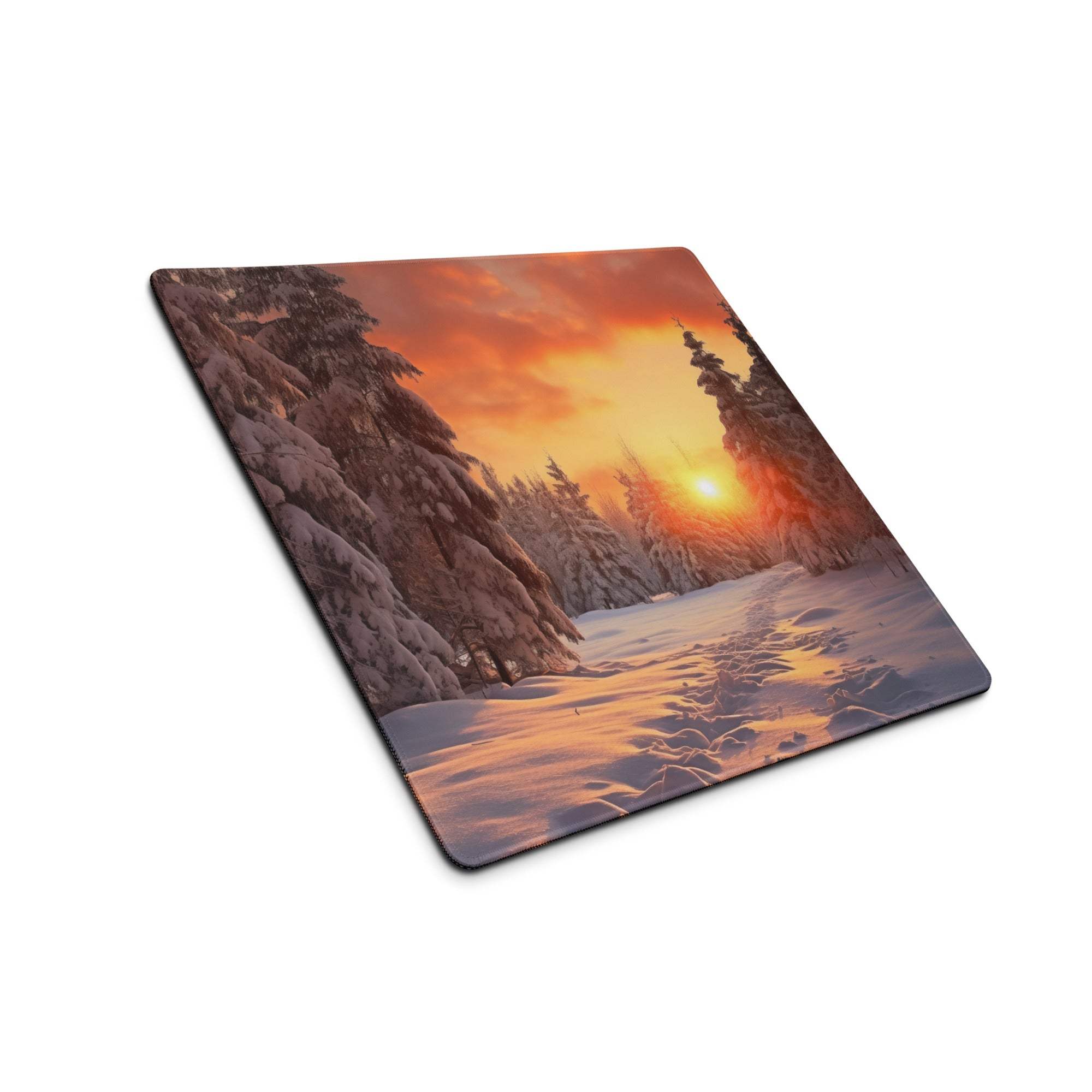 Serene winter forest sunset gaming mouse pad with orange glow