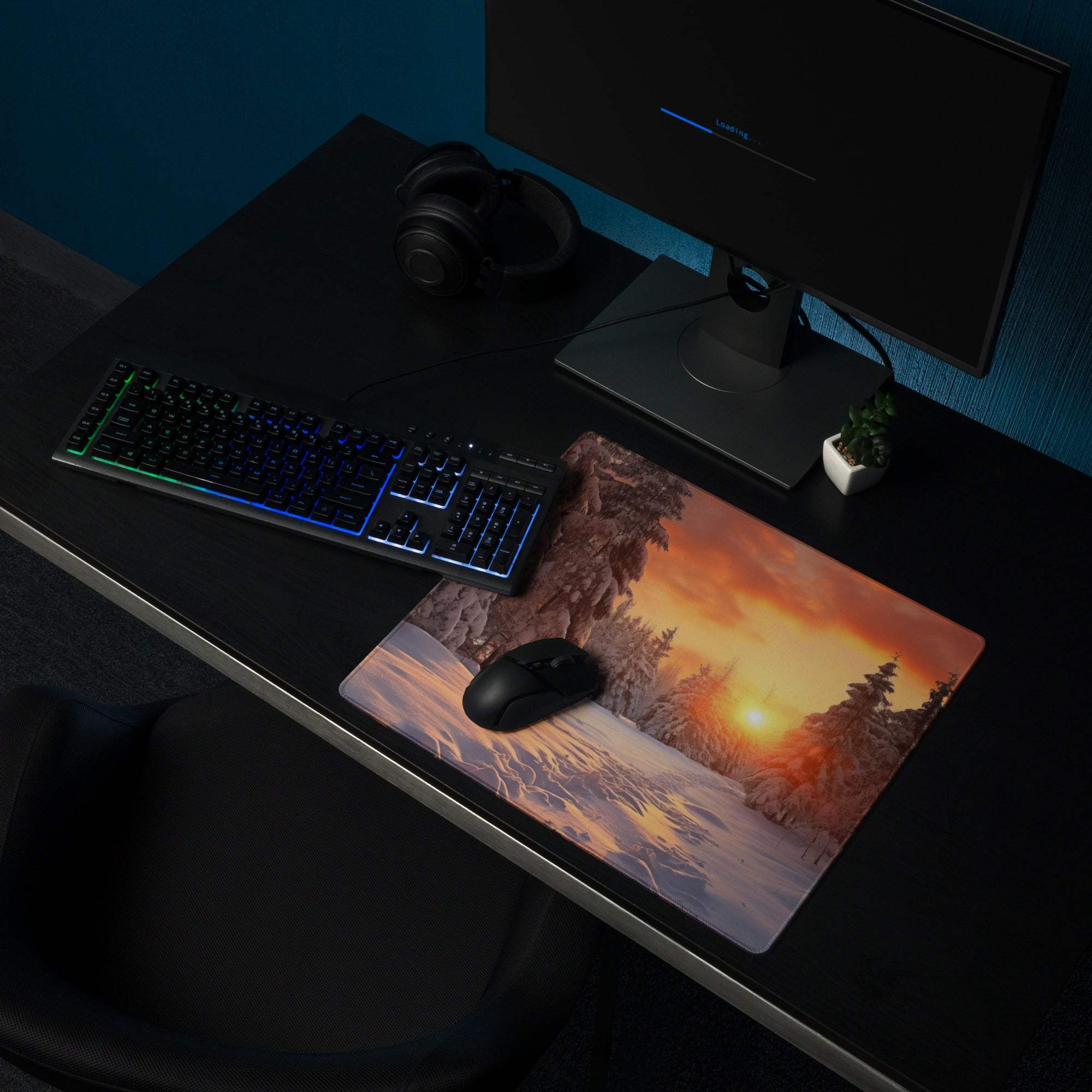 Serene winter forest sunset gaming mouse pad with warm orange glow