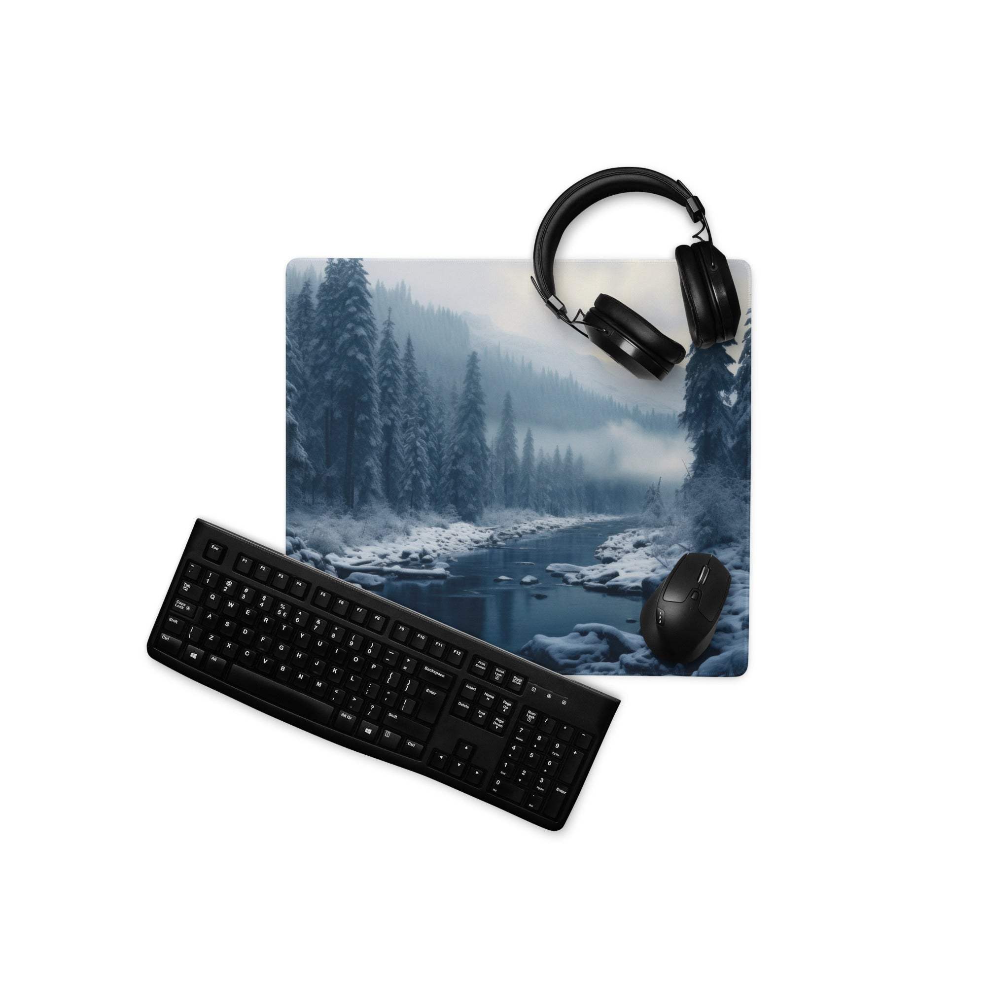 Wintry blue forest gaming mouse pad with black keyboard and mouse