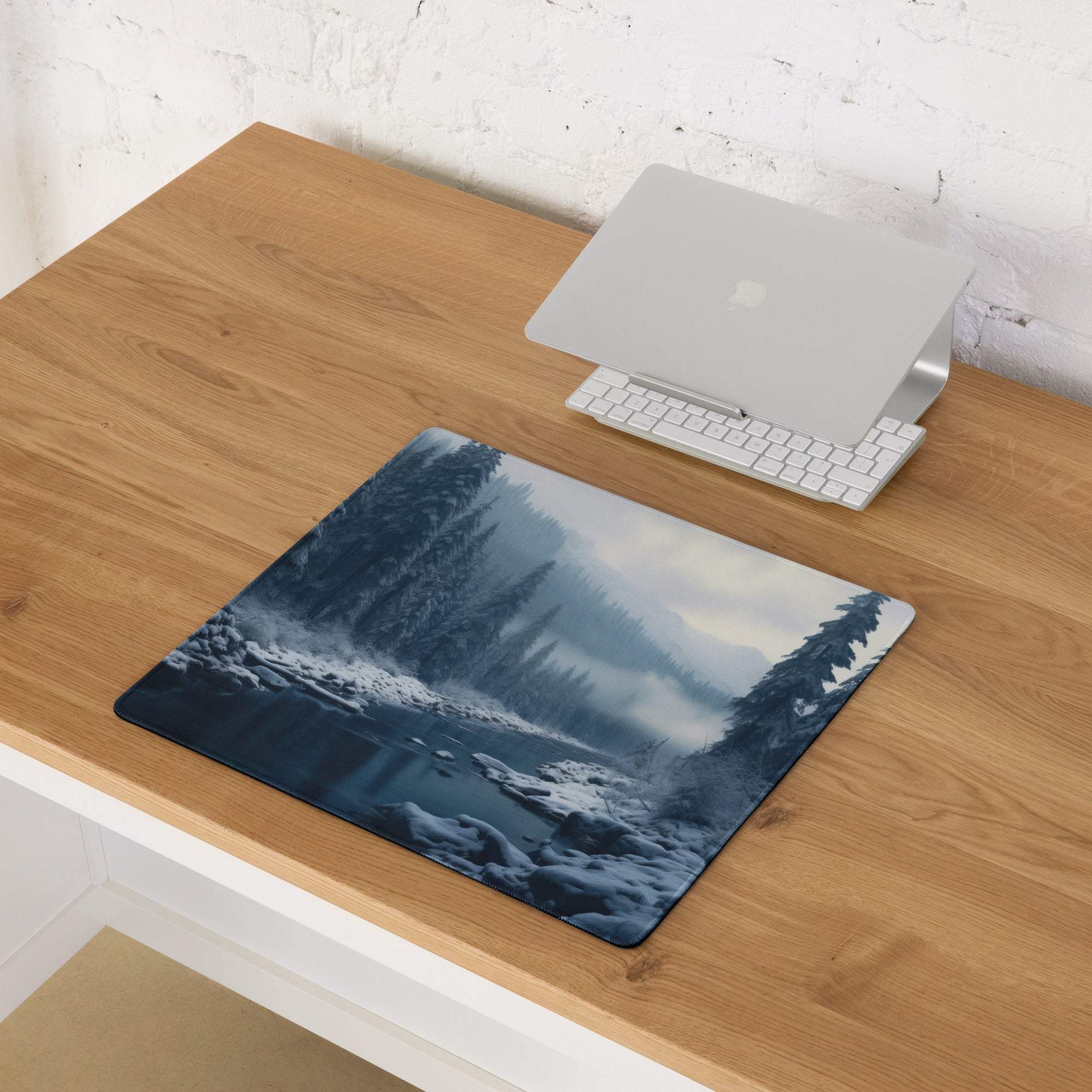 Wintry blue forest gaming mouse pad with snow trees misty mountains