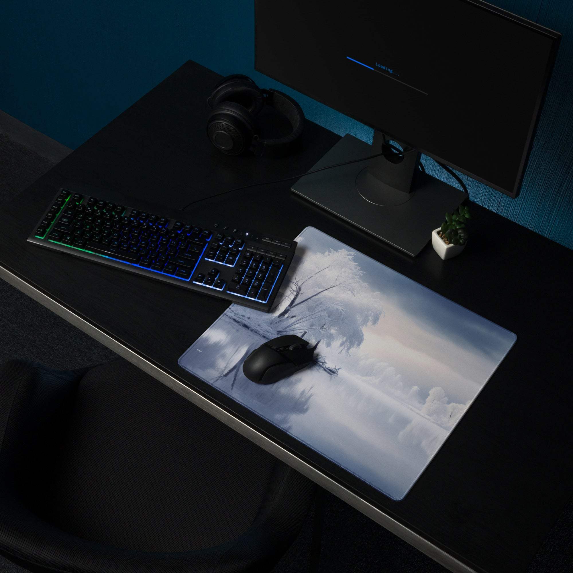 Grayscale bare frosty tree branches on cloudy sky gaming mousepad