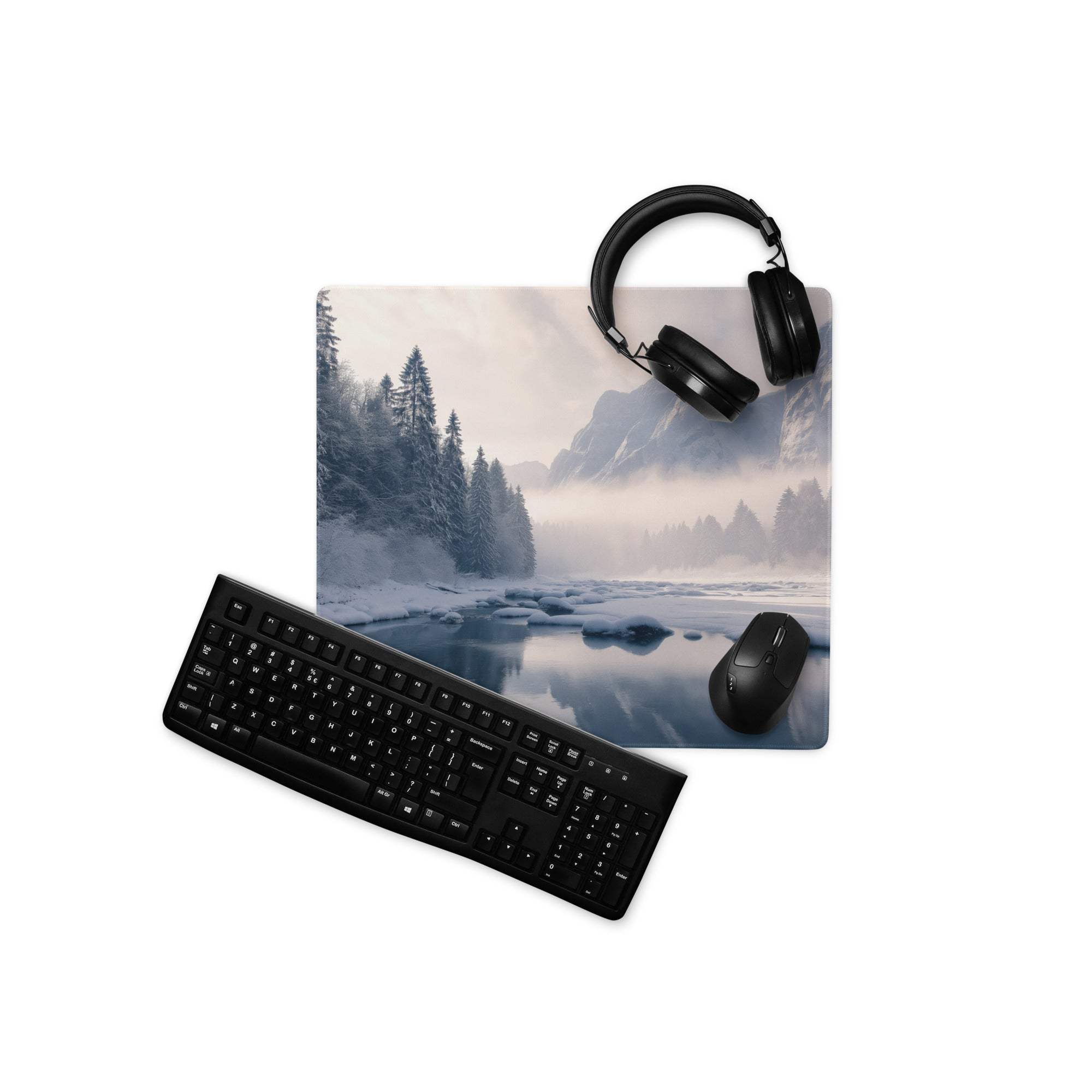 Black matte finish keyboard on Serene Winter Mountain gaming mouse pad