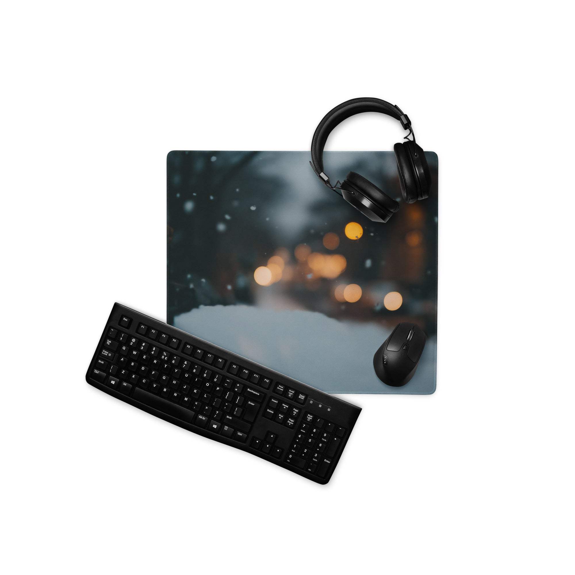 Black keyboard on Moody Midnight Blue gaming mouse pad
