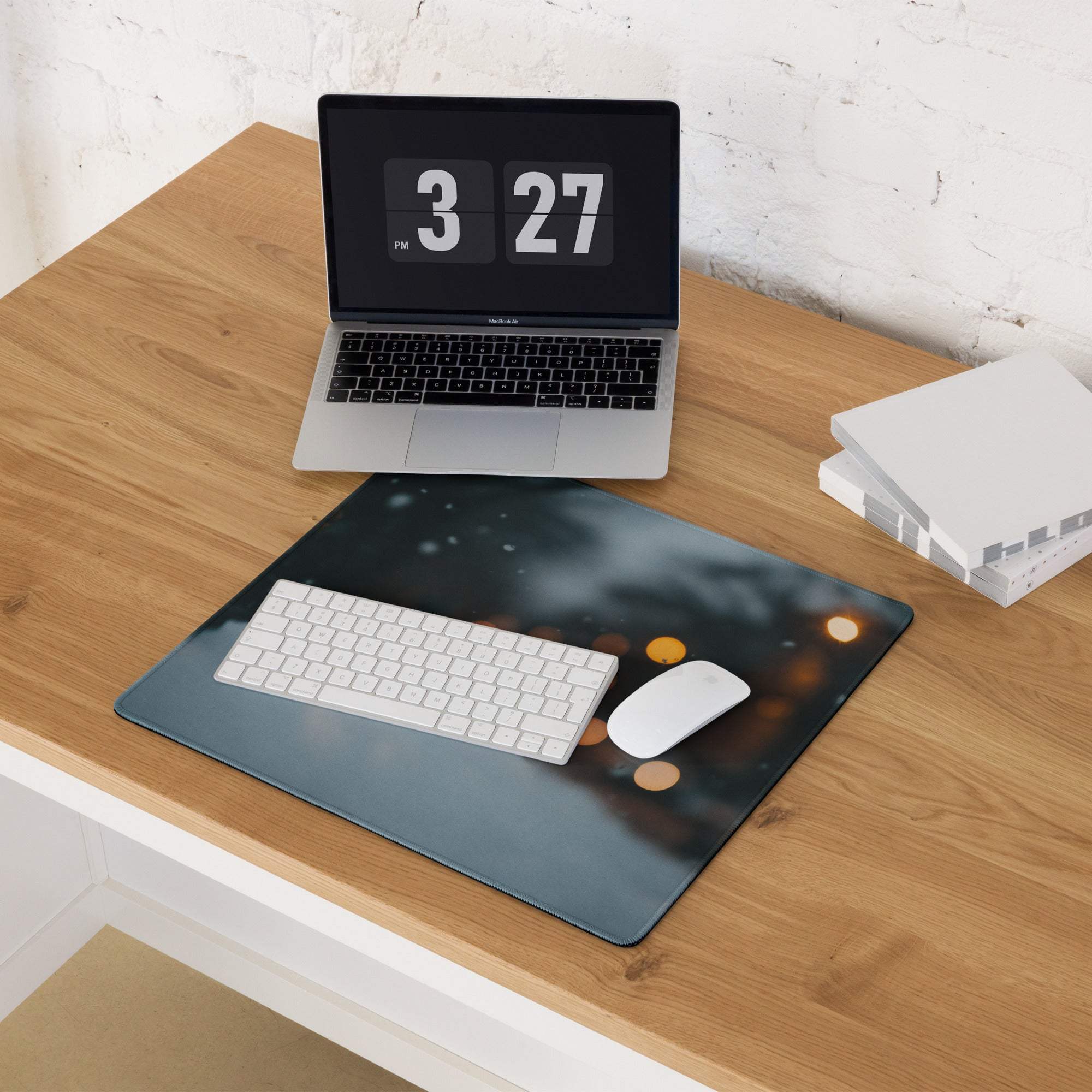 Dark gray cosmic gaming mouse pad with glowing orange orbs and starry sky