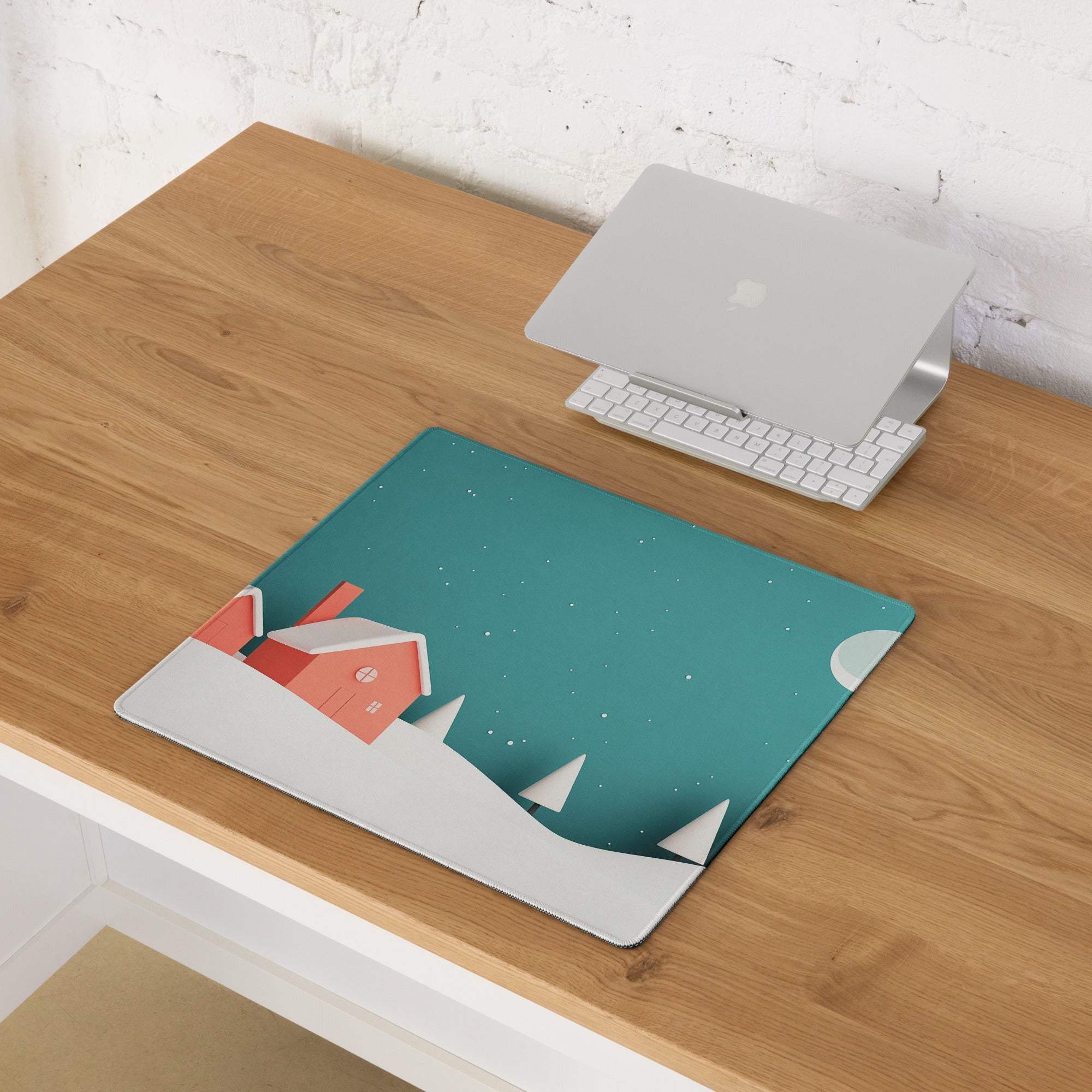 Teal Whimsical Winter Village gaming mouse pad with orange house, snow trees, starry sky