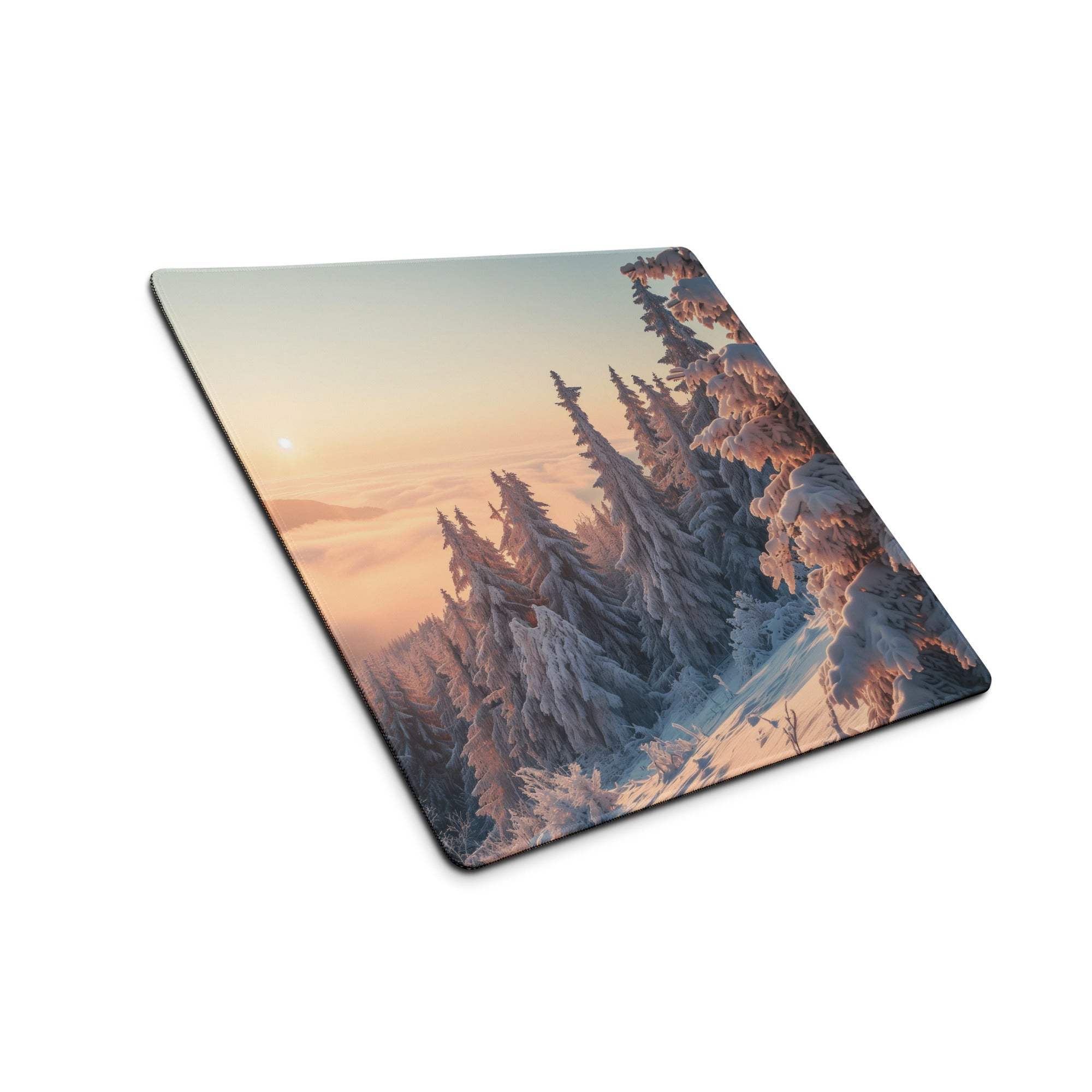 Snow-covered pine trees in warm sunrise on large gaming mouse pad