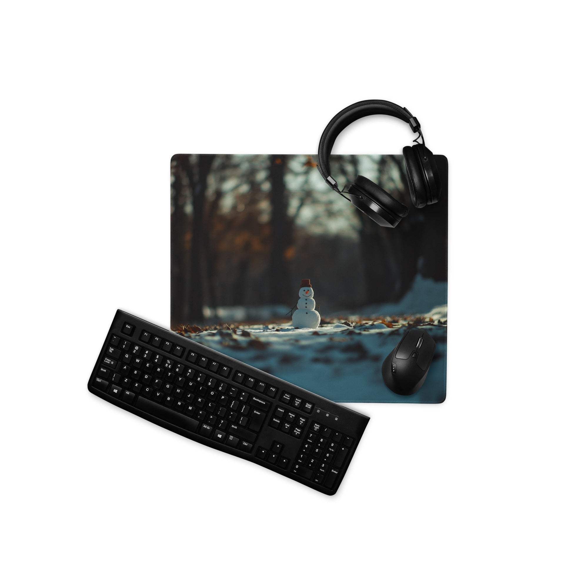 Winter Forest Serenity gaming mousepad with black keyboard, mouse, snowy scene