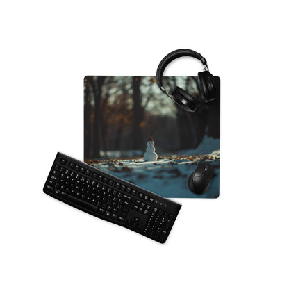 Winter Forest Serenity gaming mousepad with black keyboard, mouse, snowy scene